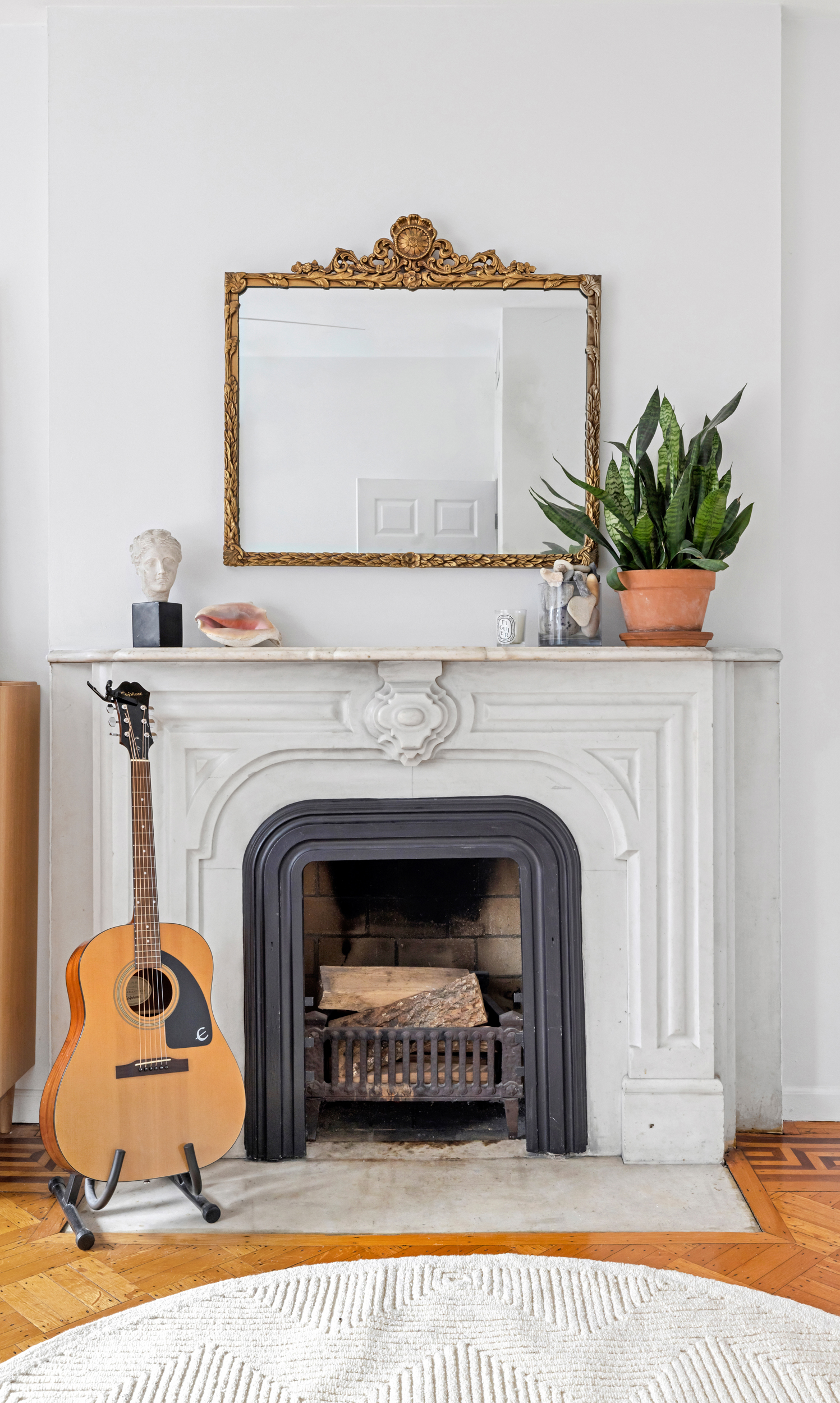 31 1st Place, Unit 3 Brooklyn, NY 11231 - Photo 6 of 11 a view of a livingroom with a fireplace and a potted plant