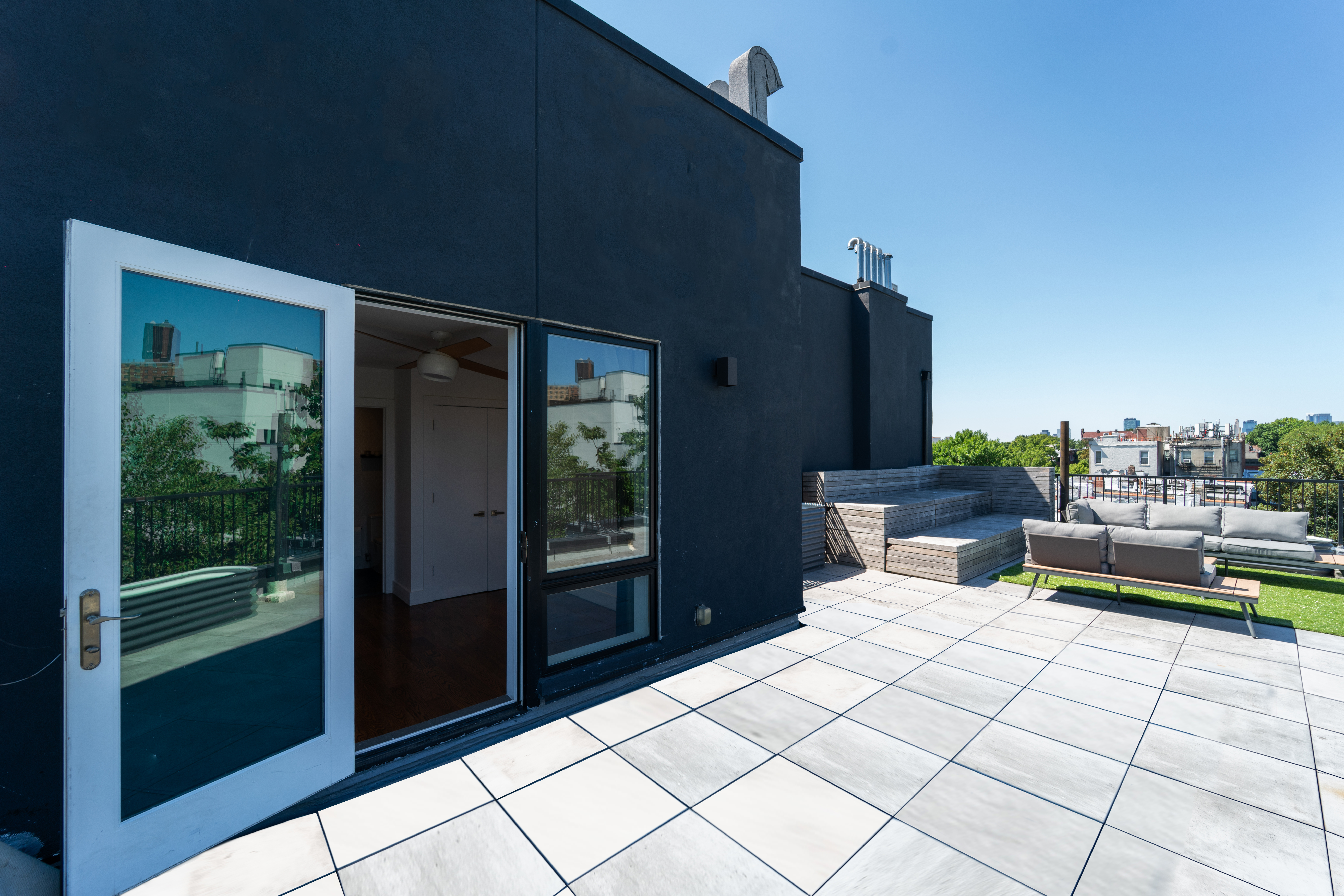 299 Van Buren Street, Unit 4C Brooklyn, NY 11221 - Photo 4 of 16 a living room with furniture