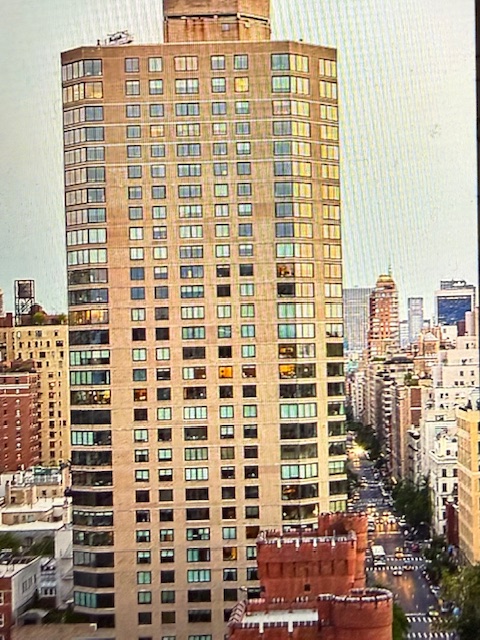 40 East 94th Street, Unit 6F Manhattan, NY 10128 - Photo 13 of 17 a view of a city with tall buildings