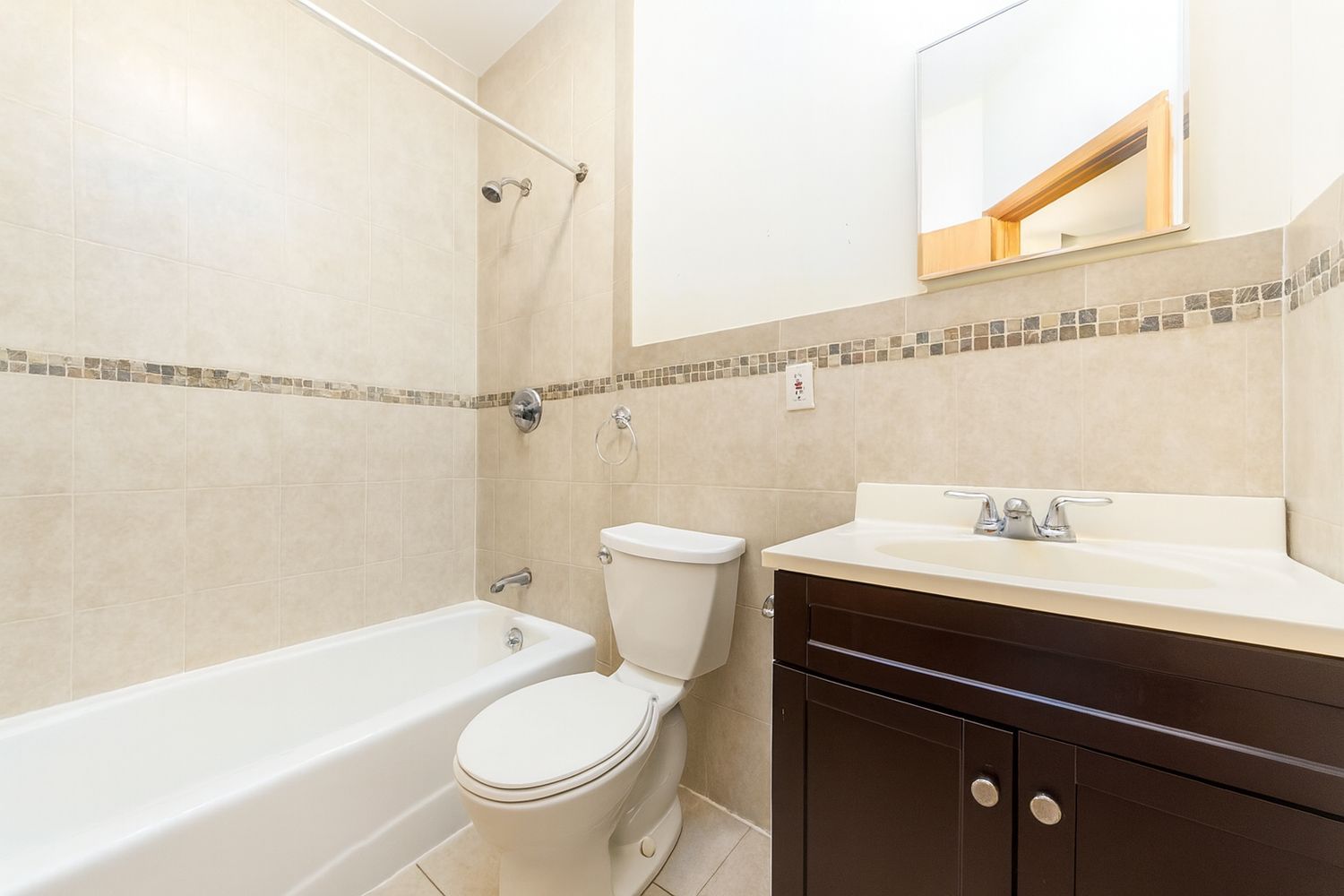 a bathroom with a sink a toilet and a bathtub