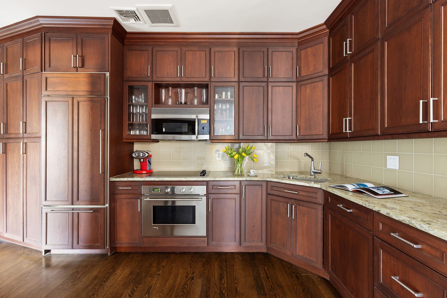 a bedroom with a bed and a lamp