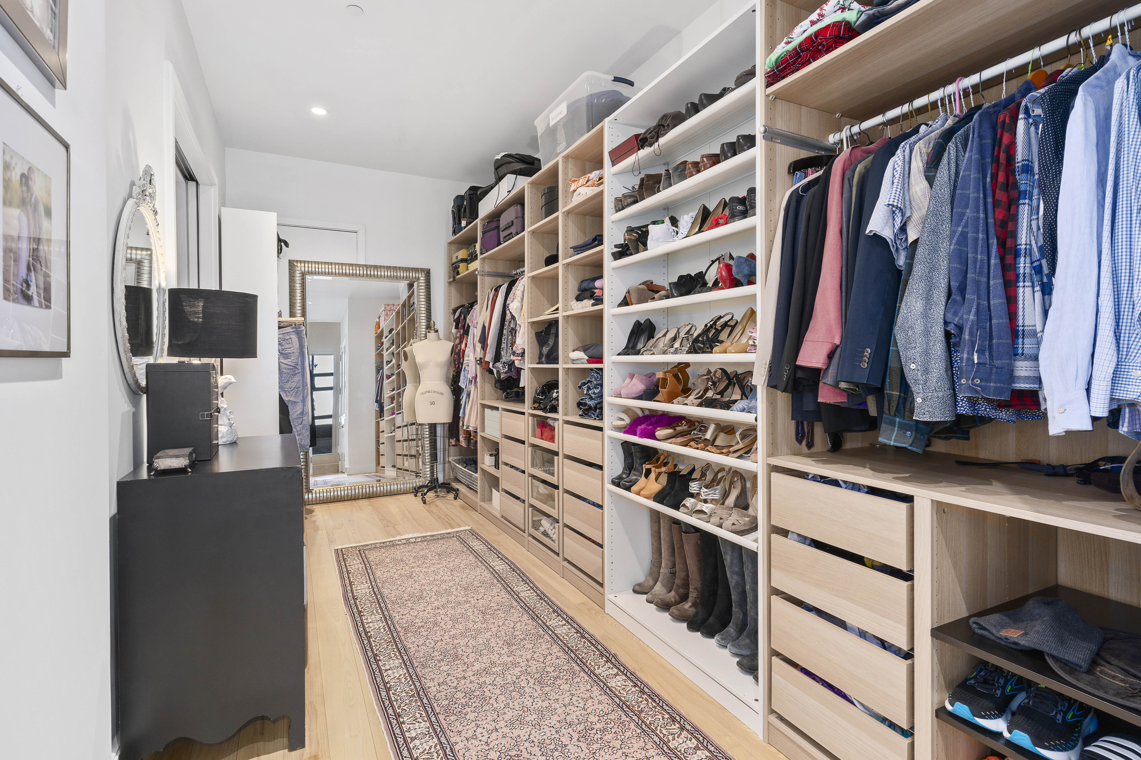 360 Furman Street, Unit 734 Brooklyn, NY 11201 - Photo 10 of 31 a view of walk in closet with clothes and shoes
