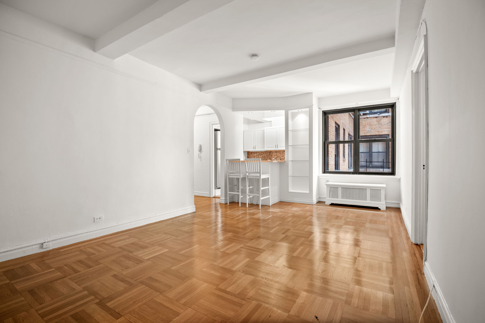 235 West End Avenue, Unit 12H Manhattan, NY 10023 - Photo 3 of 17 a view of an empty room with a window