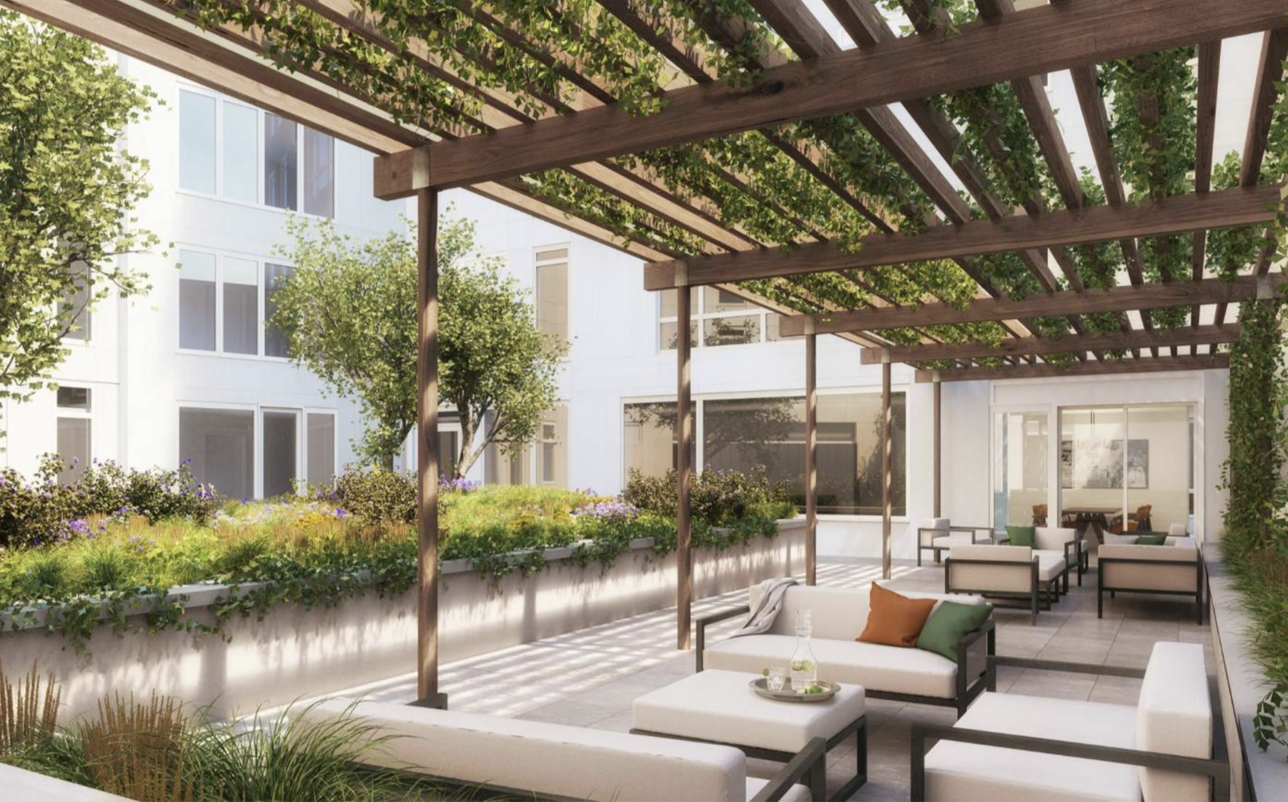 285 West 110th Street, Unit 9B Manhattan, NY 10026 - Photo 16 of 20 a view of a patio with couches table and chairs and potted plants with wooden floor and plants