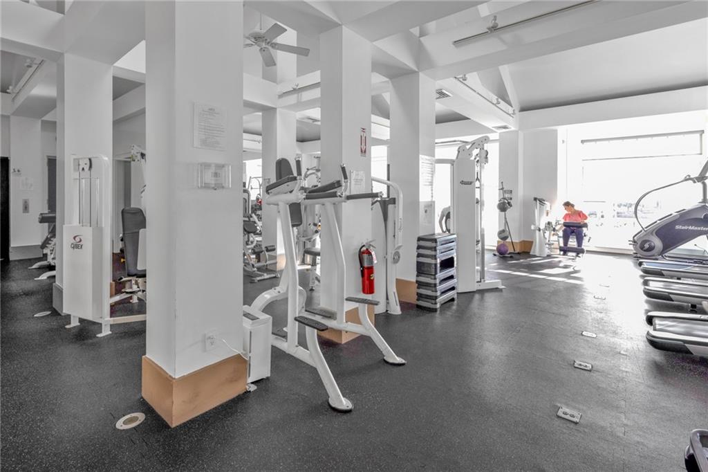 135 Oceana Drive East, Unit 2C Brooklyn, NY 11235 - Photo 22 of 29 a view of a room with gym equipment