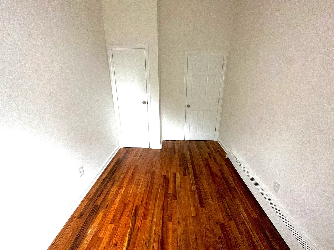 918 Dekalb Avenue, Unit 1 Brooklyn, NY 11221 - Photo 5 of 11 a view of wooden floor in a hallway