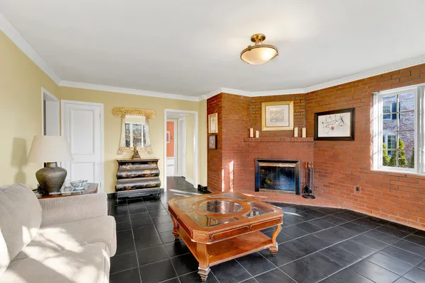 a bedroom with a bed and a table