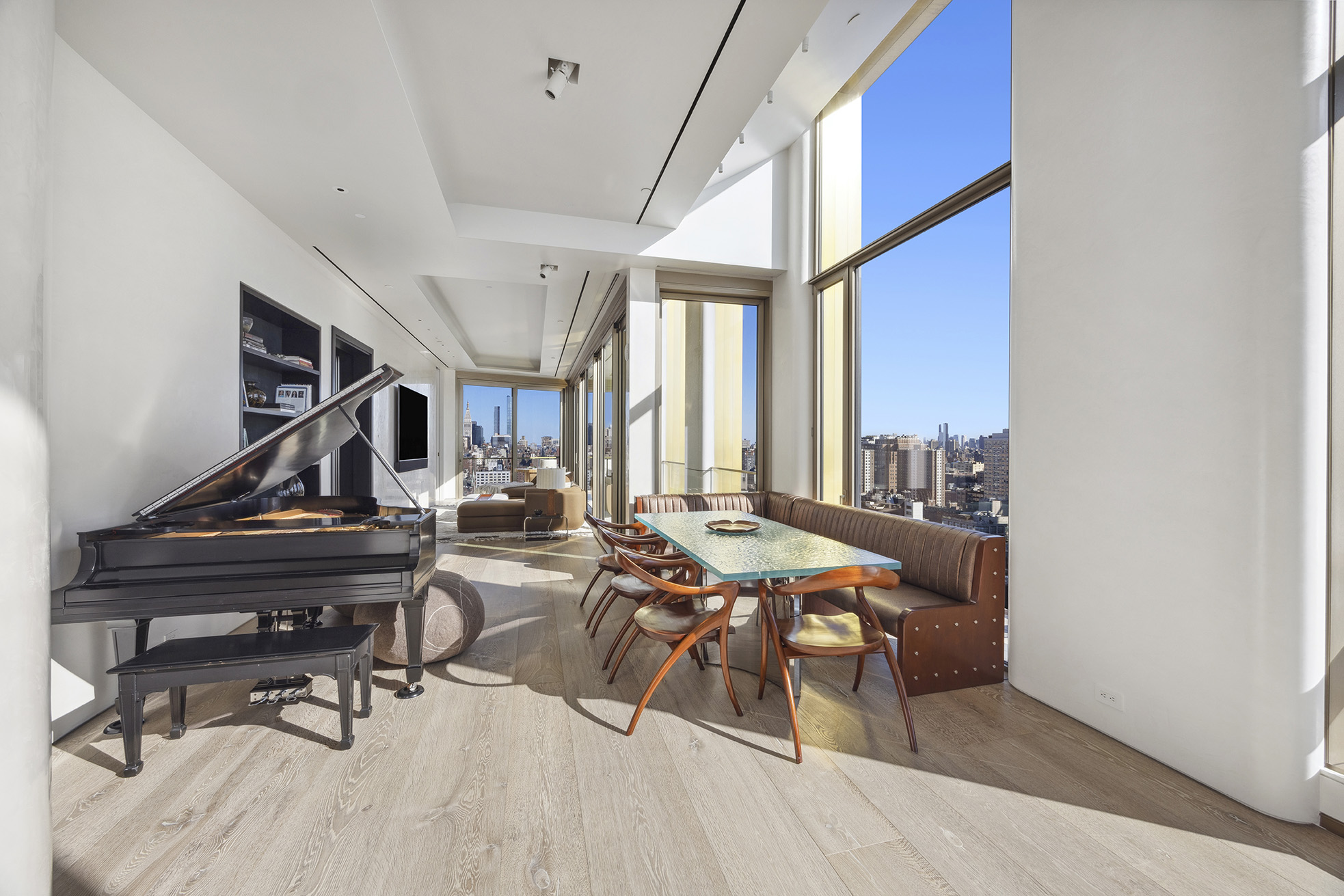551 West 21st Street, Unit PH Manhattan, NY 10011 - Photo 32 of 51 a view of a livingroom with furniture and a table