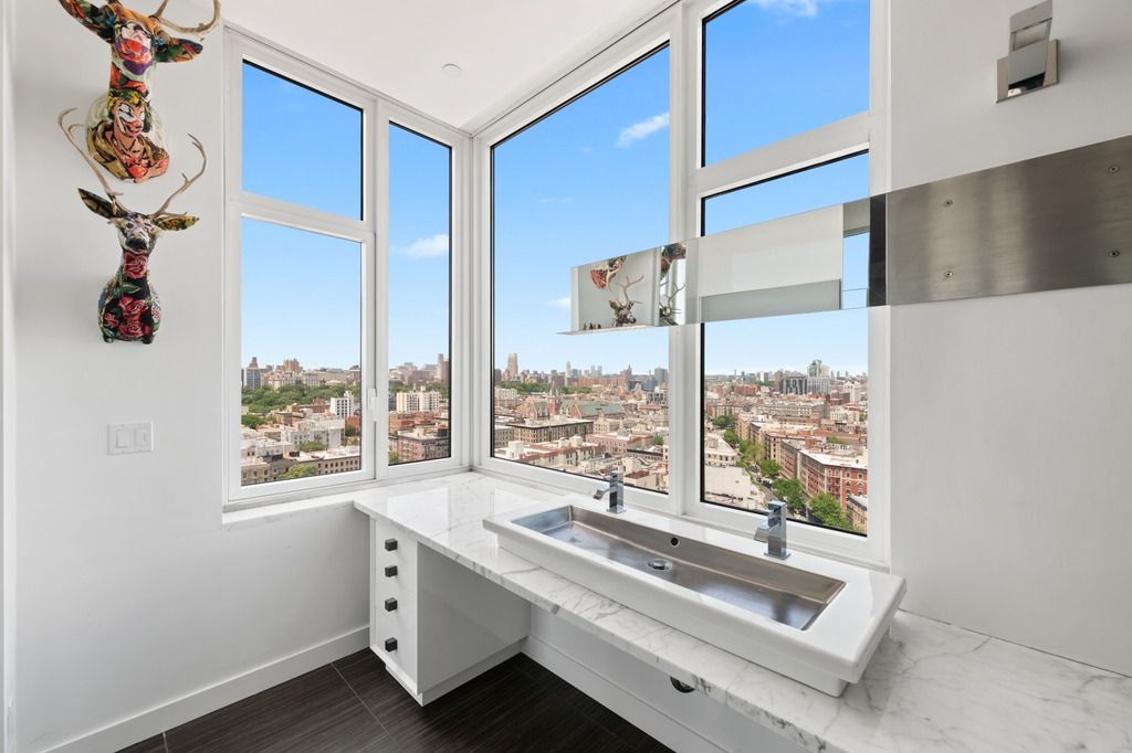 a room with view of wooden floor and window
