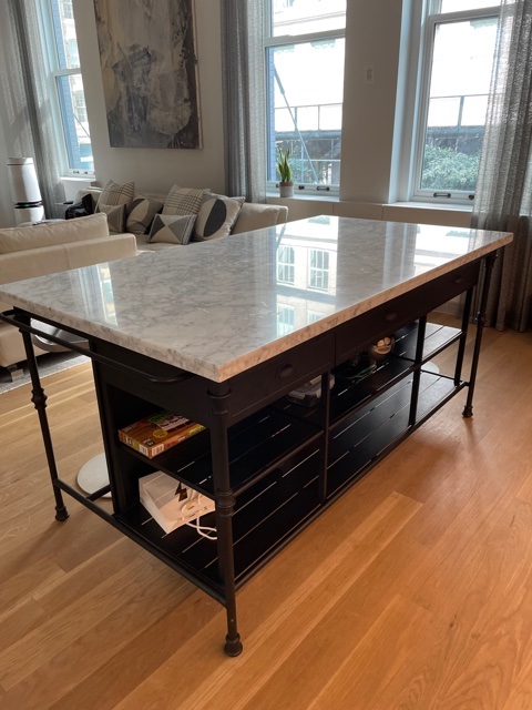 71 Laight Street, Unit 2E Manhattan, NY 10013 - Photo 7 of 12 a view of a room with a table and chairs