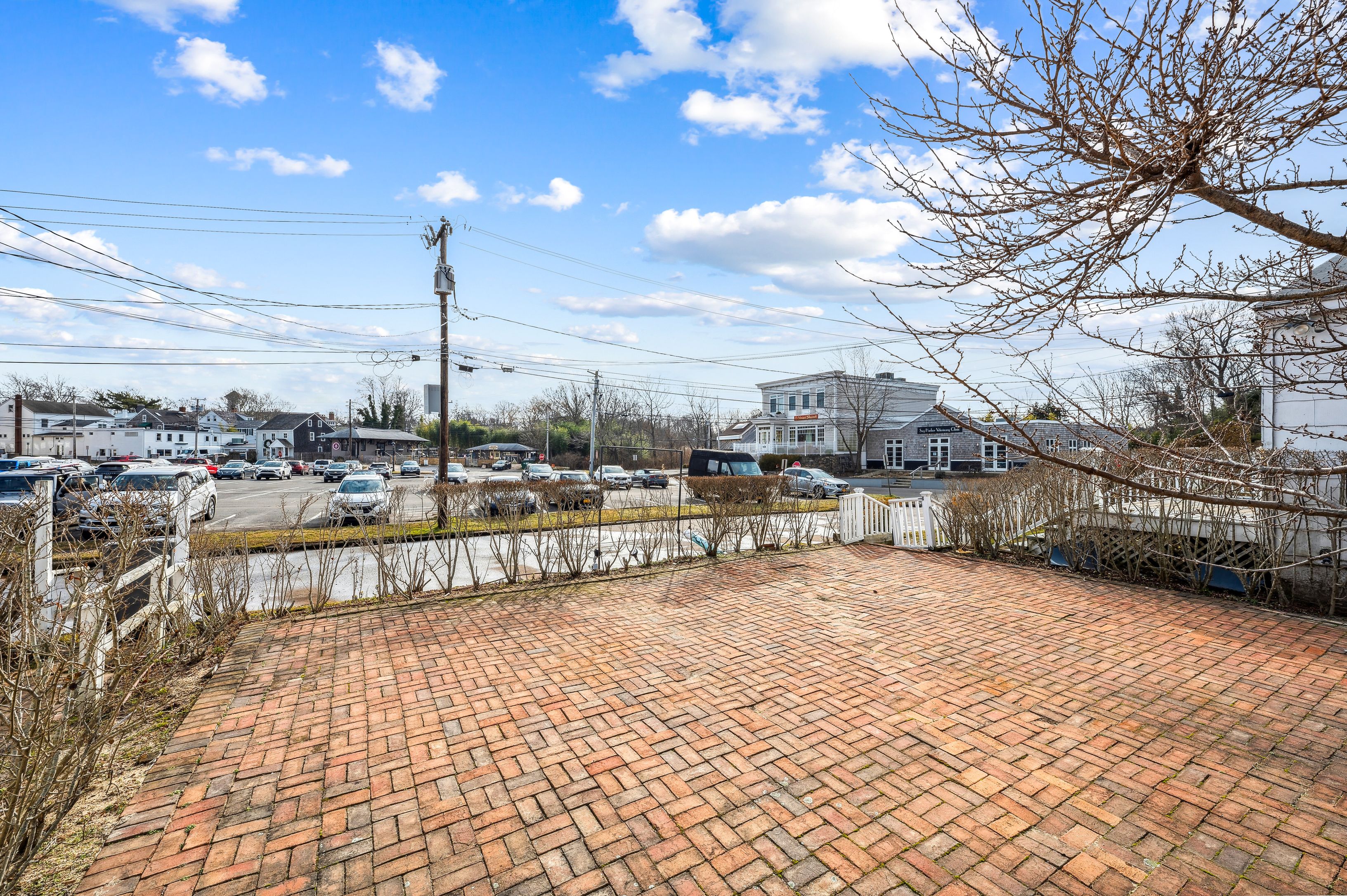 23 Bridge Street Sag Harbor, NY 11963 - Photo 24 of 25 a view of swimming pool with outdoor seating and city view