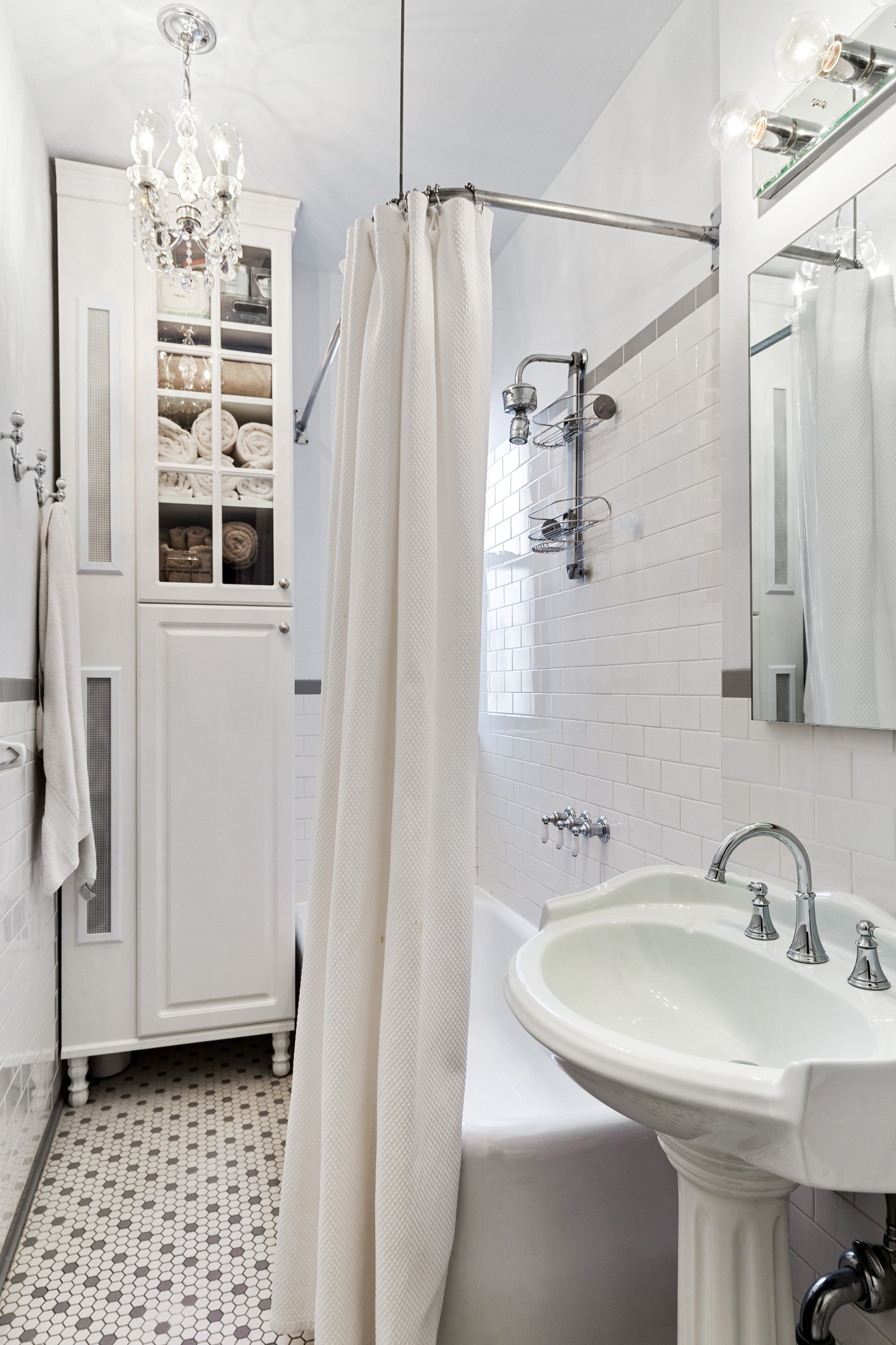 125 Cabrini Boulevard, Unit A52 Manhattan, NY 10033 - Photo 13 of 20 a bathroom with a sink and a mirror