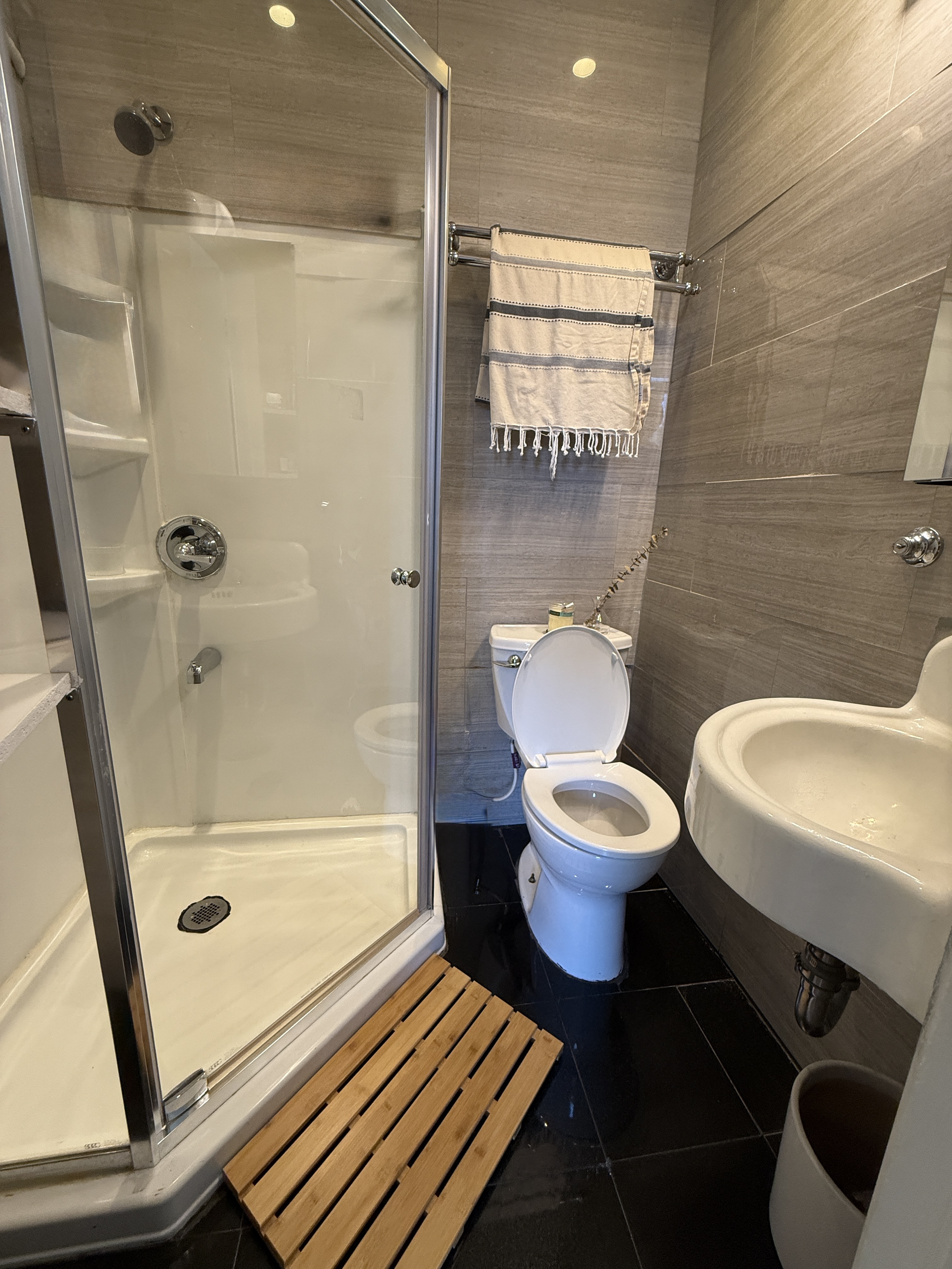 814 Putnam Avenue, Unit 2 Brooklyn, NY 11221 - Photo 8 of 8 a bathroom with a toilet and a shower