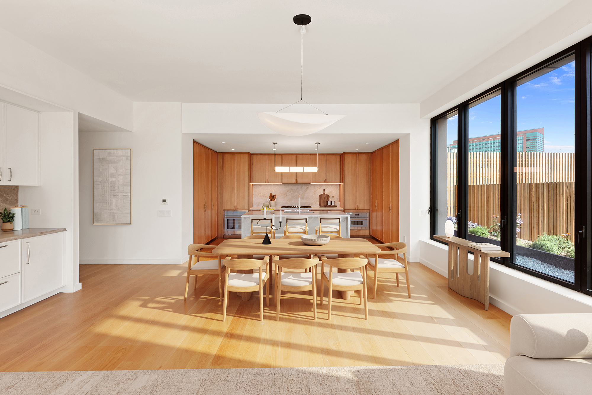 323 Bergen Street, Unit 601W Brooklyn, NY 11217 - Photo 4 of 34 a large white kitchen with a large window