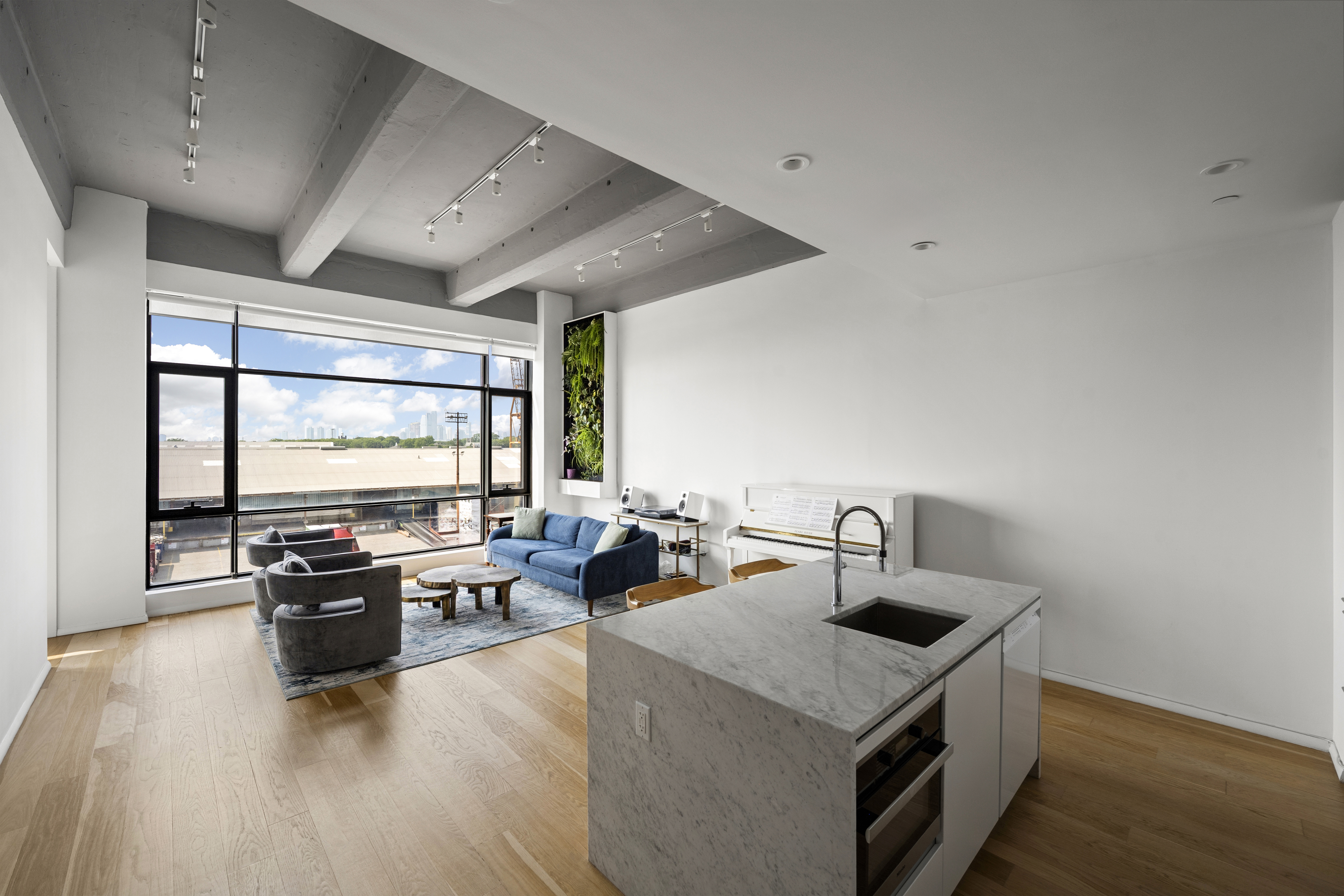 160 Imlay Street, Unit 3B3 Brooklyn, NY 11231 - Photo 4 of 14 a kitchen with sink cabinets and wooden floor