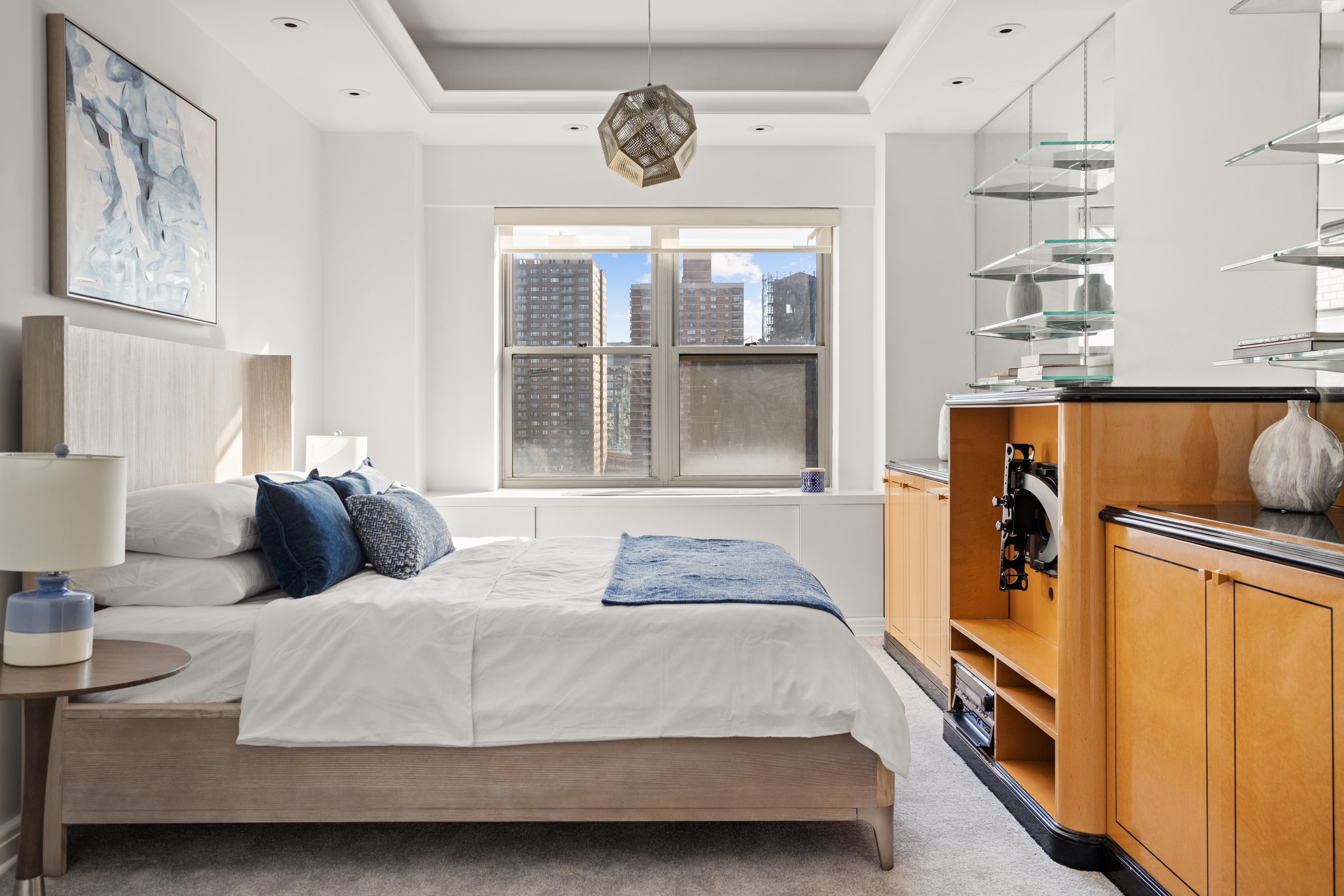 2 5th Avenue, Unit PHDF Manhattan, NY 10011 - Photo 14 of 24 a bedroom with a bed and a window