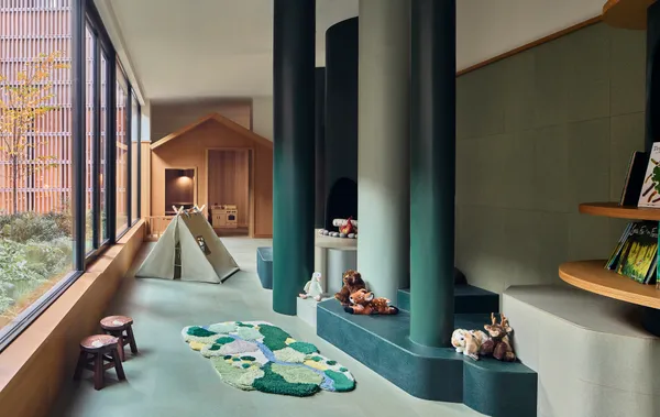 a living room with baby toys