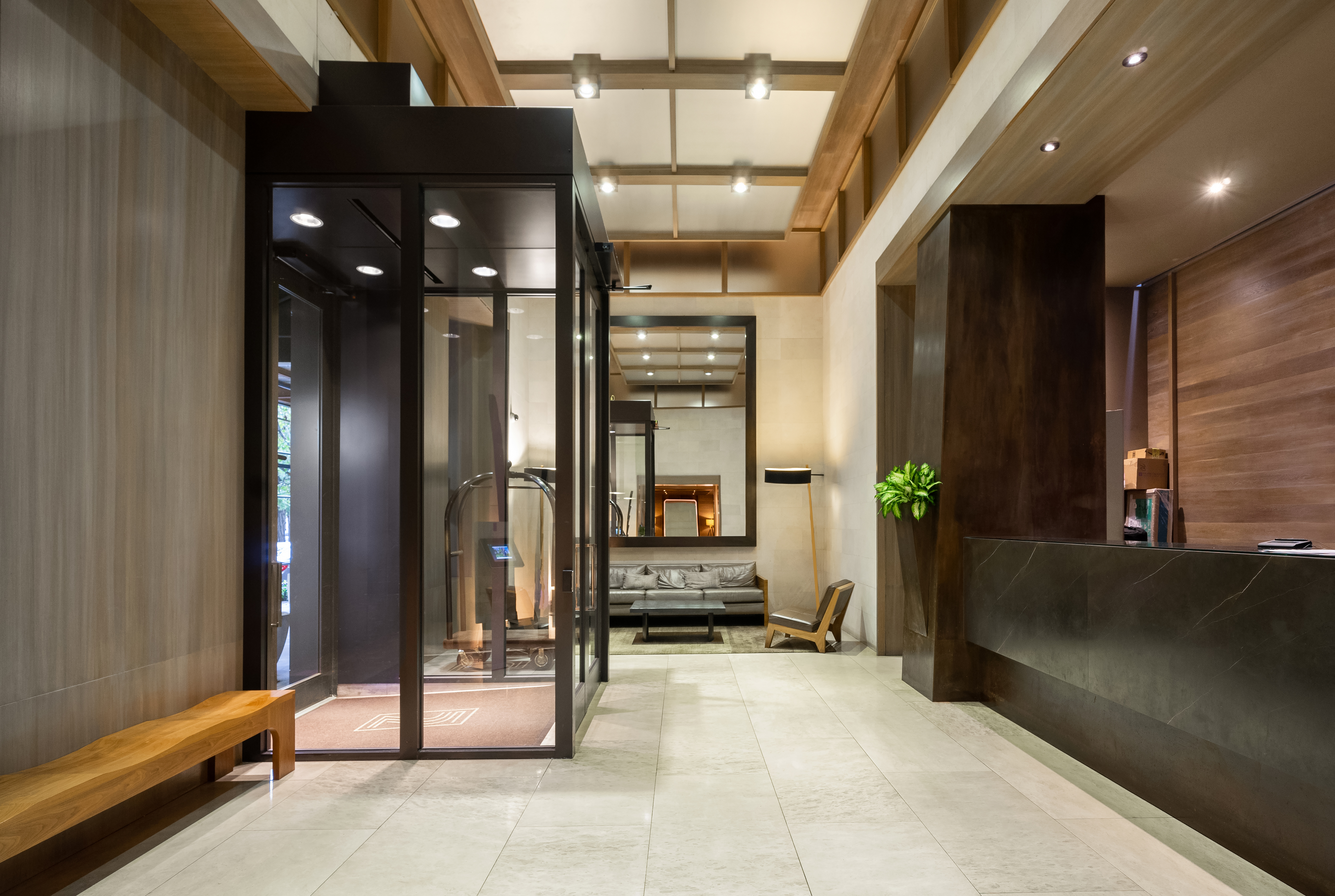 225 Rector Place, Unit 2D Manhattan, NY 10280 - Photo 8 of 17 a view of a lobby room with a furniture and windows