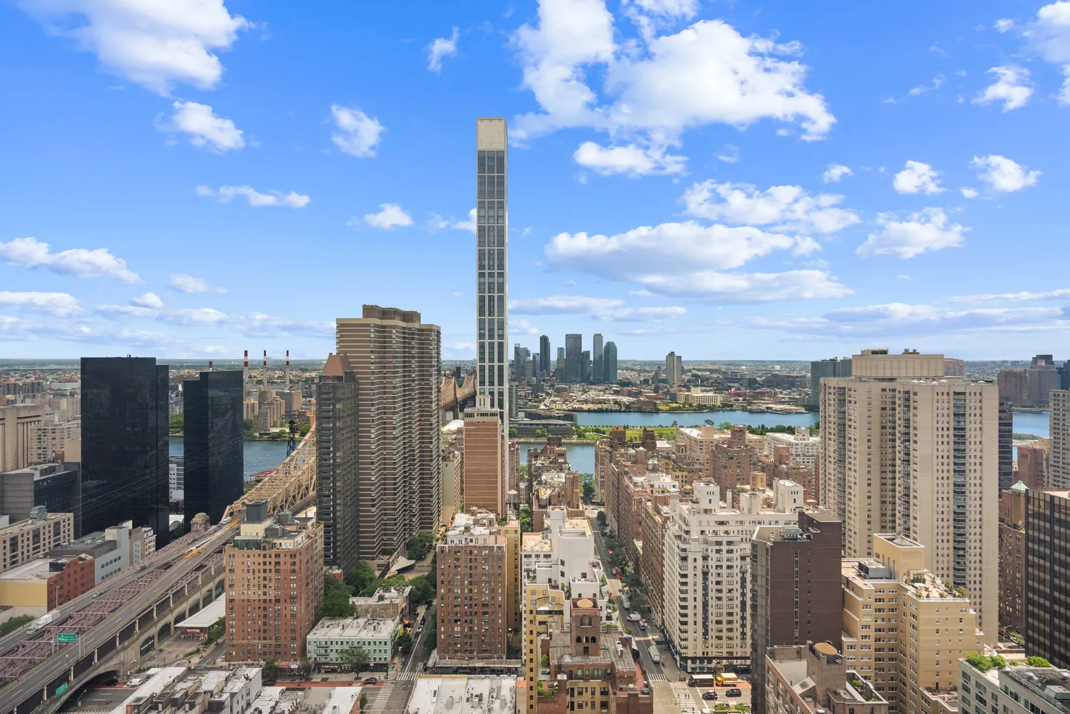 a view of a city with tall buildings