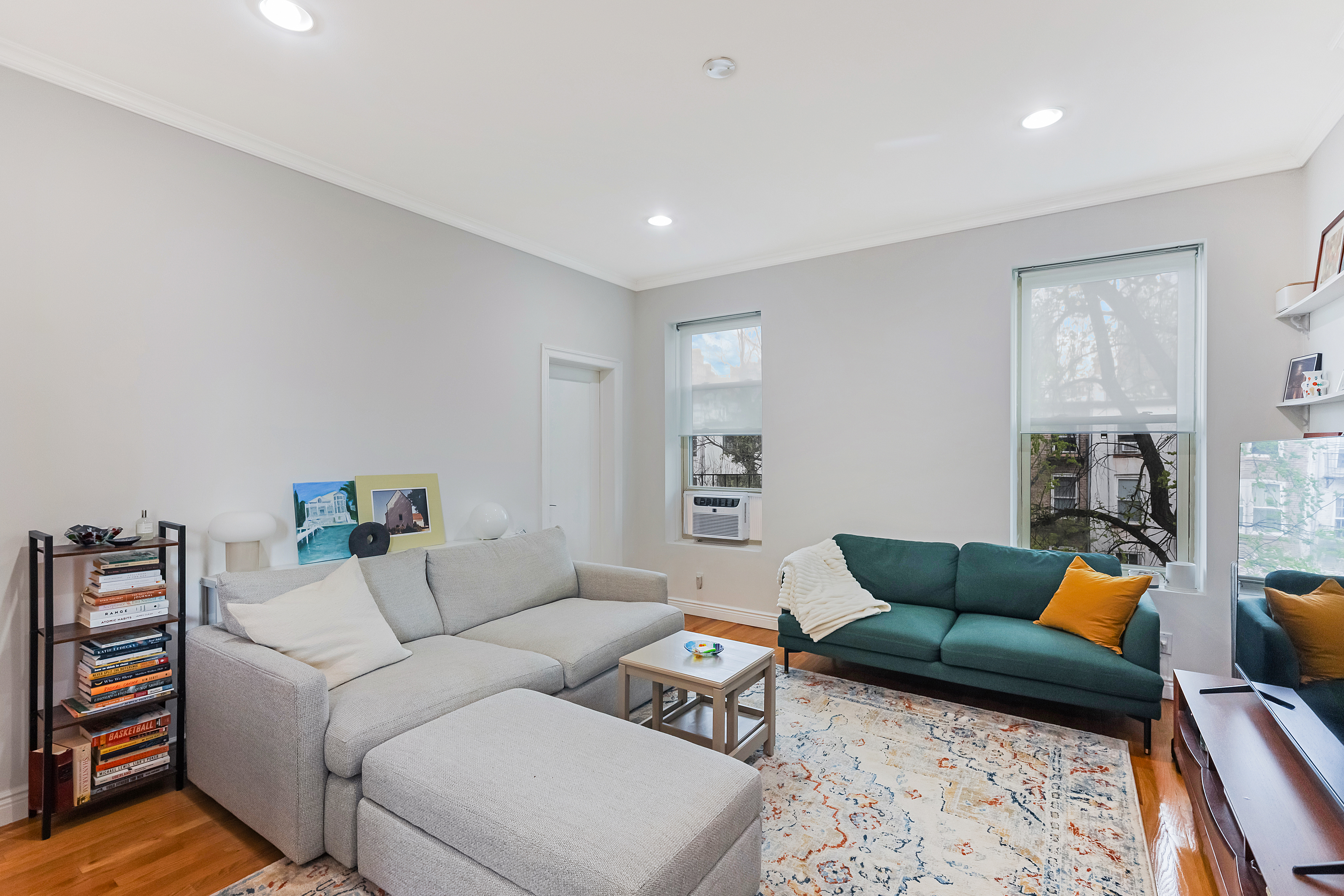 89 Wyckoff Street, Unit 4B Brooklyn, NY 11201 - Photo 4 of 9 a living room with furniture and a couch