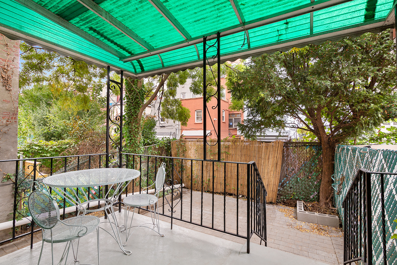 165 Fenimore Street Brooklyn, NY 11225 - Photo 11 of 13 a view of a chair and tables in the patio