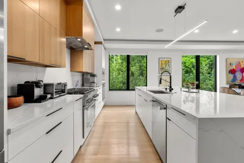 a living room with furniture flat screen tv and a fireplace