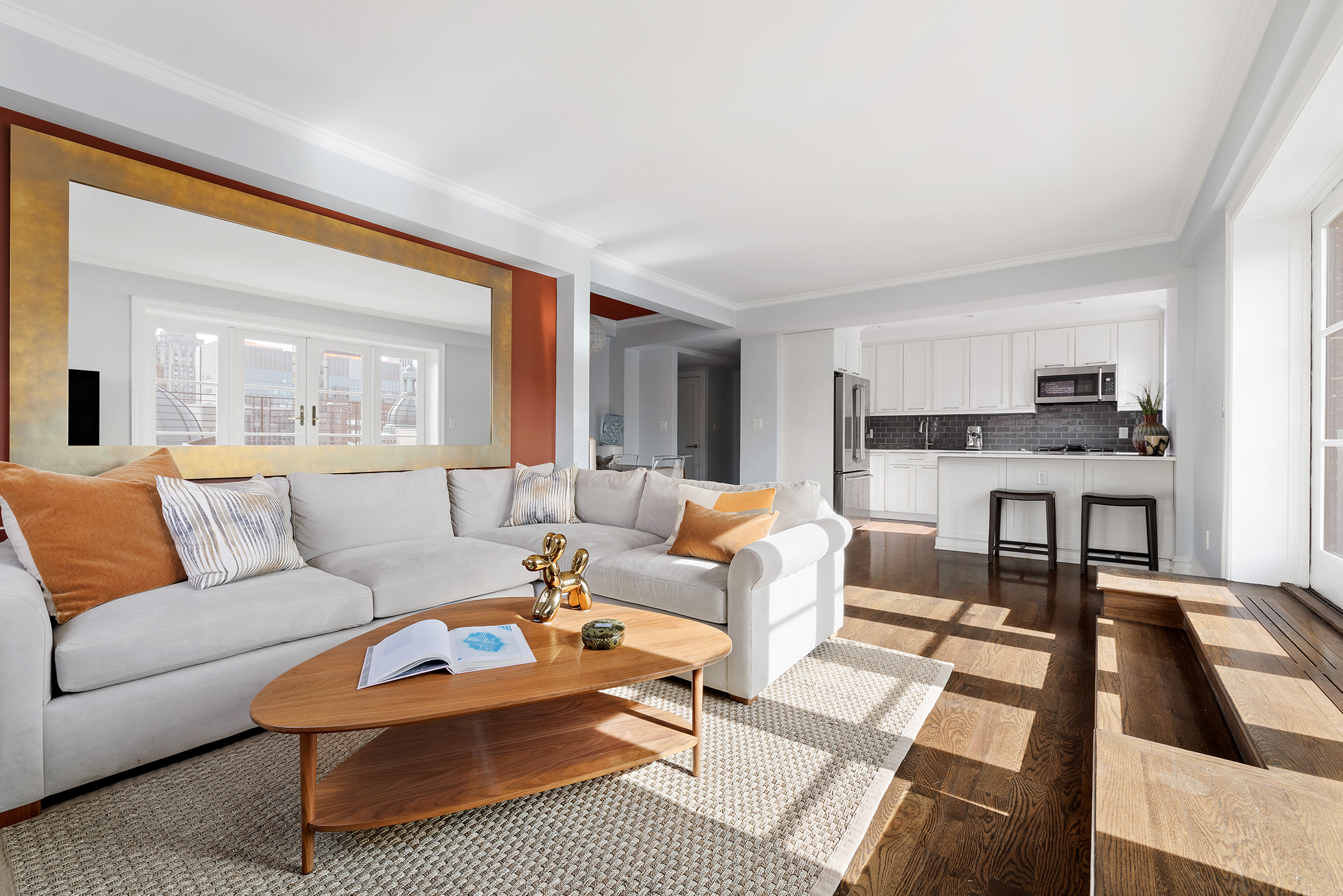 136 East 76th Street, Unit 16DE Manhattan, NY 10021 - Photo 3 of 14 a living room with furniture and a large window