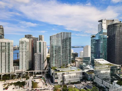 a view of city with tall buildings