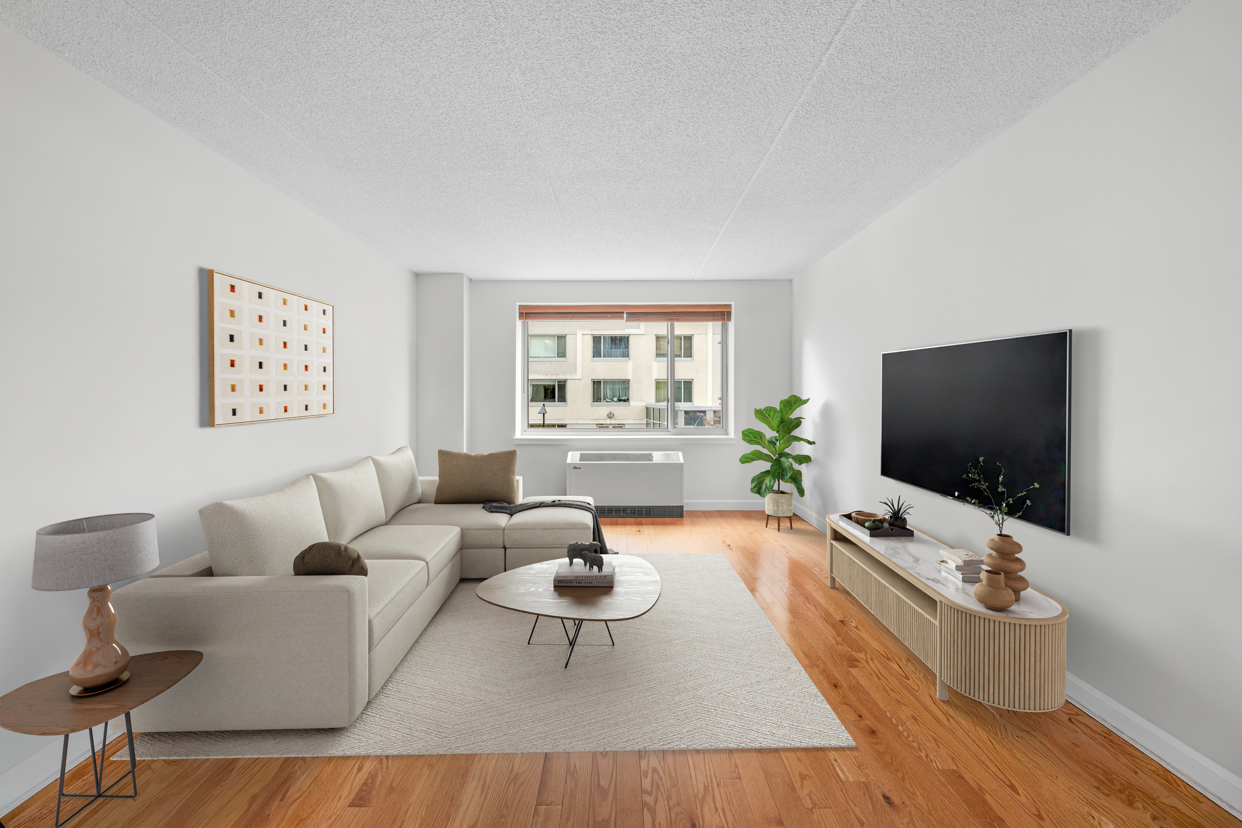 40 West 116th Street, Unit B301 Manhattan, NY 10026 - Photo 2 of 17 a living room with furniture and a flat screen tv