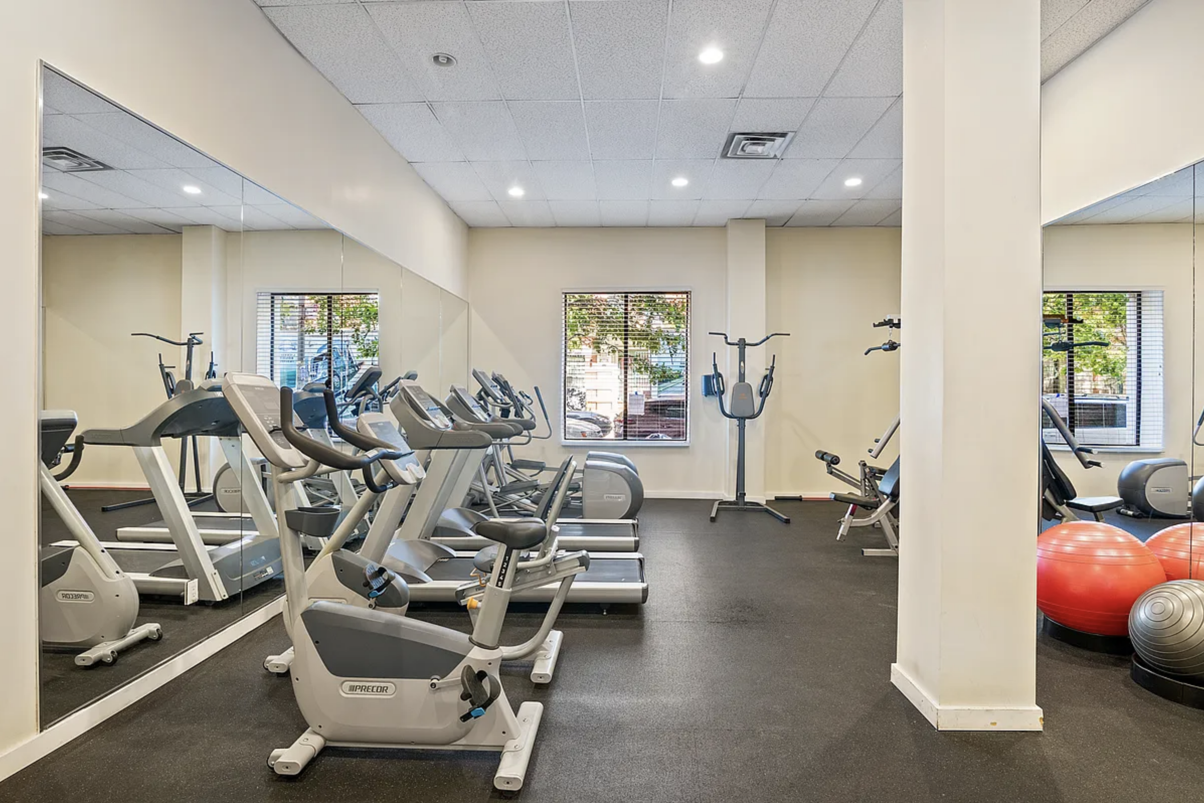 234 West 148th Street, Unit 5C Manhattan, NY 10039 - Photo 10 of 15 a view of a room with gym equipment