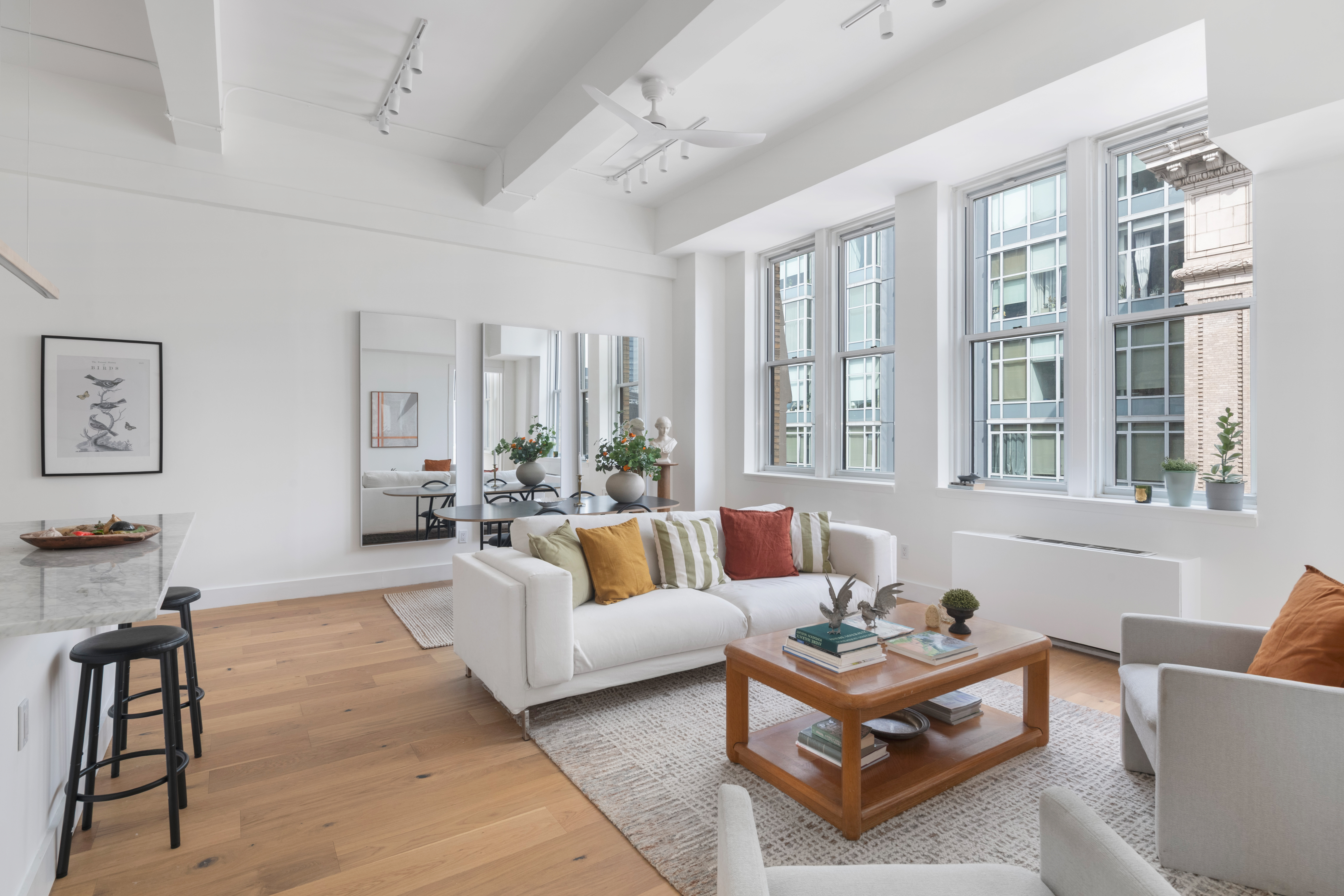 96 Schermerhorn Street, Unit 11F Brooklyn, NY 11201 - Photo 1 of 13 a living room with furniture and a large window