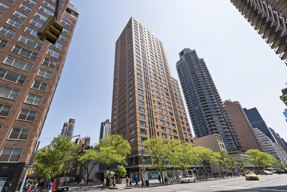 200 East 62nd Street, Unit 27A Manhattan, NY 10065 - Photo 13 of 19 a view of a tall building