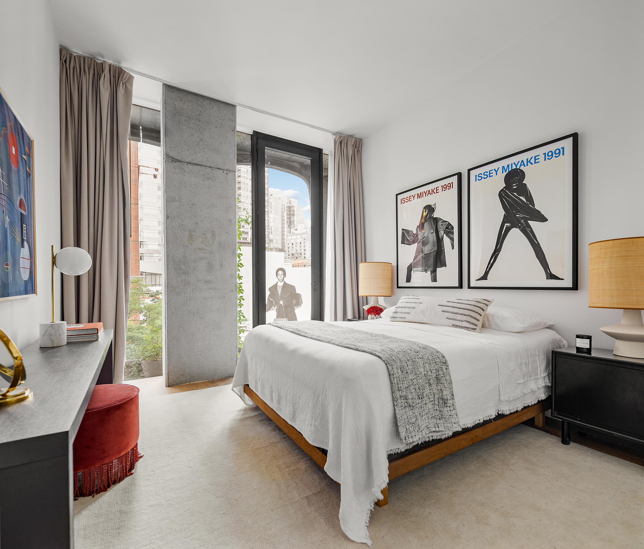 325 West Broadway, Unit 4B Manhattan, NY 10013 - Photo 10 of 17 a bedroom with a bed couch and a window