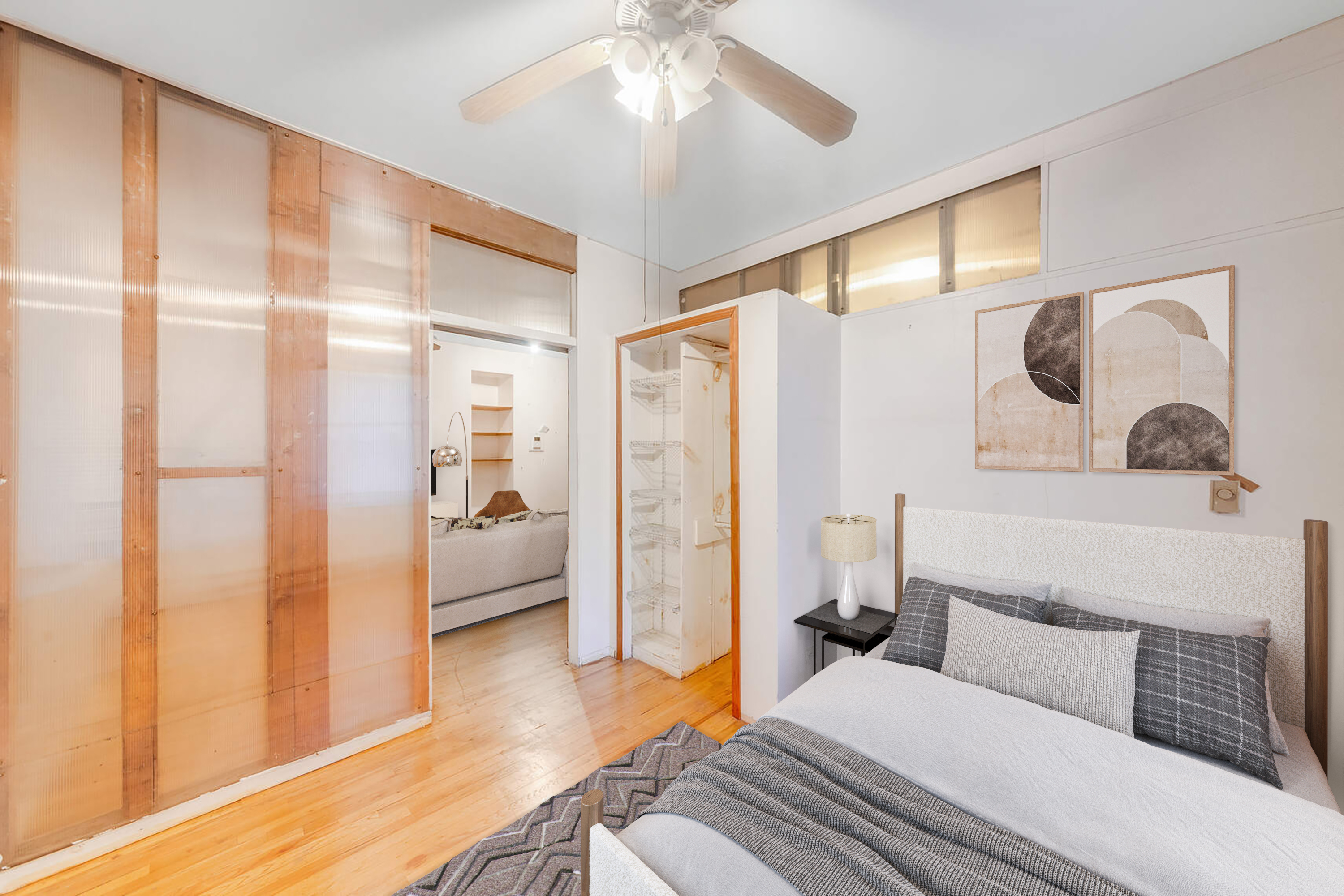 604 Riverside Drive, Unit 1B Manhattan, NY 10031 - Photo 10 of 14 a bedroom with a large bed and a chandelier