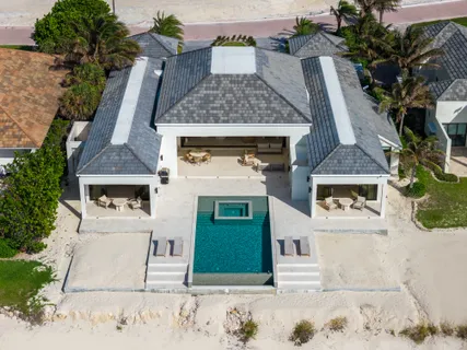 an aerial view of a house with a garden