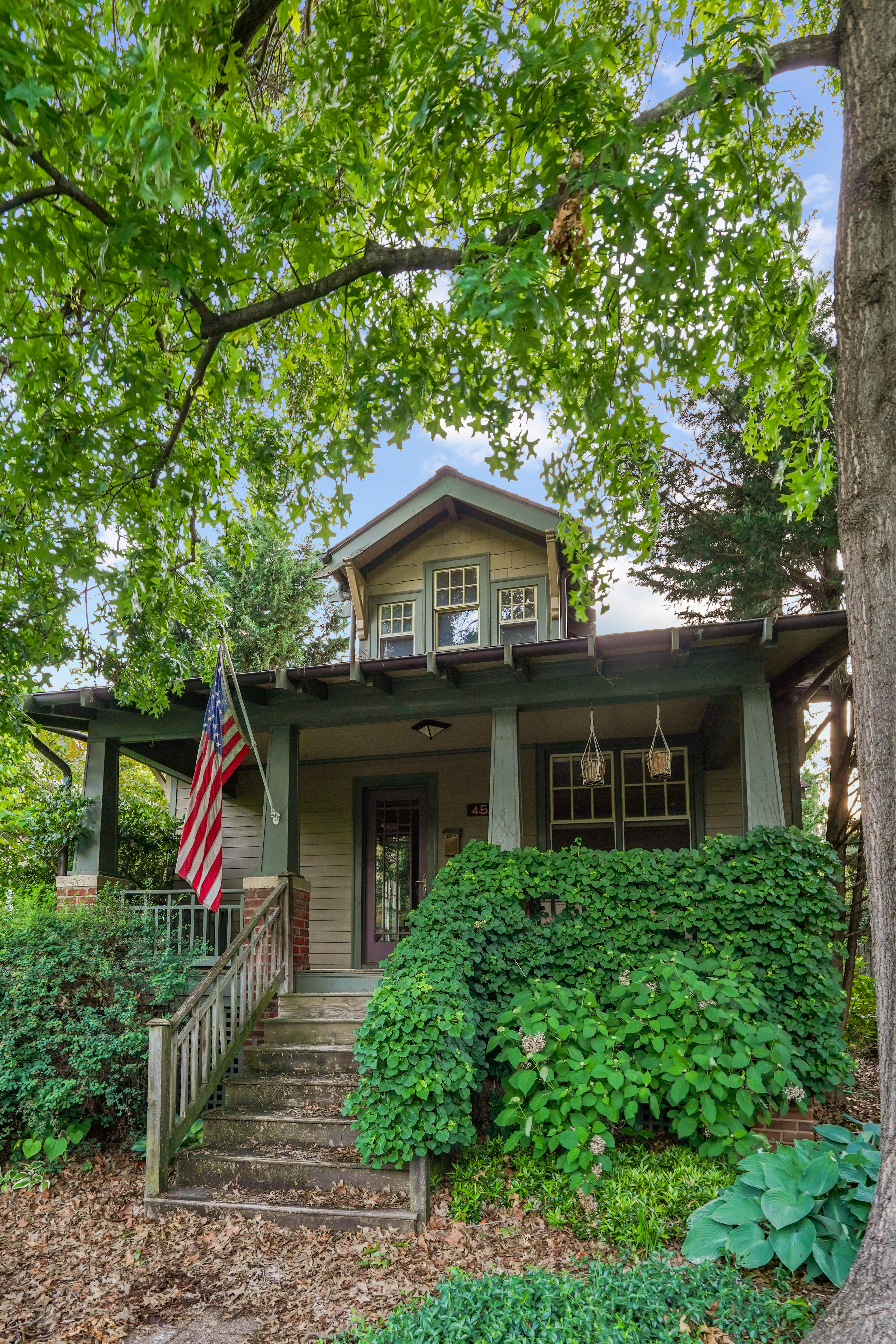 4528 49th Street Northwest Washington, DC 20016 - Photo 1 of 2 a front view of house with an tree