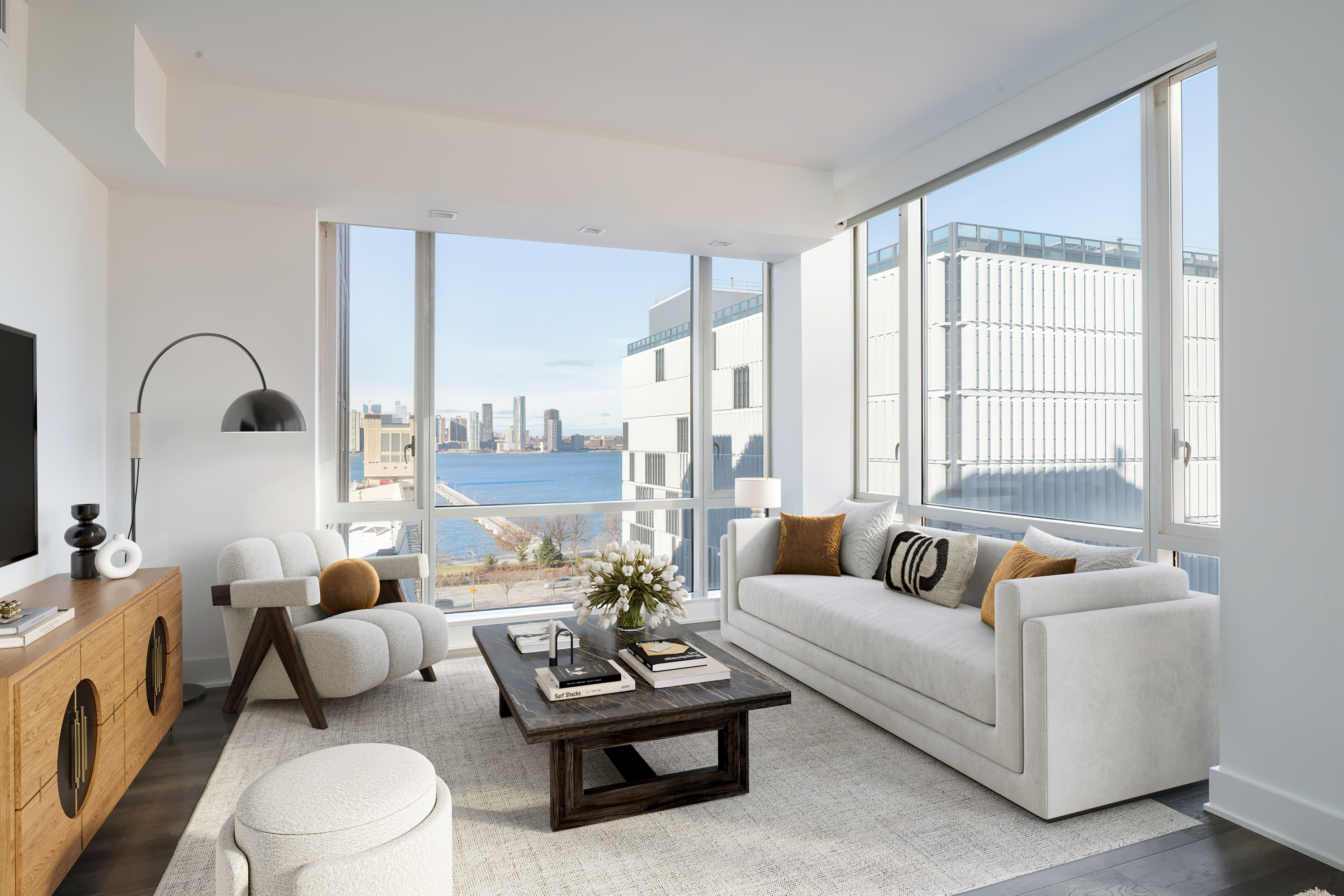 330 Spring Street, Unit 8B Manhattan, NY 10013 - Photo 4 of 14 a living room with furniture and a large window