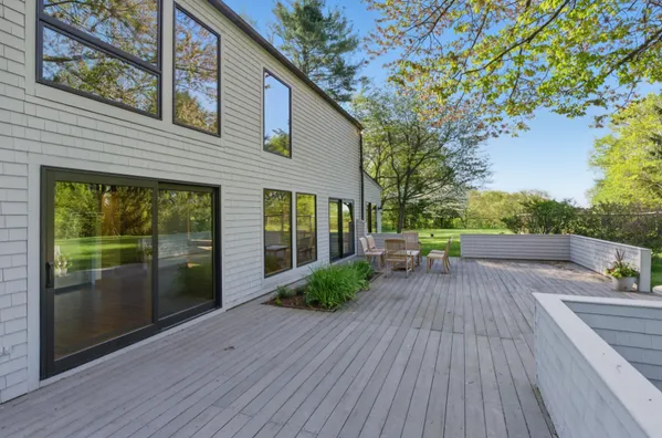 a view of house with backyard and outdoor space