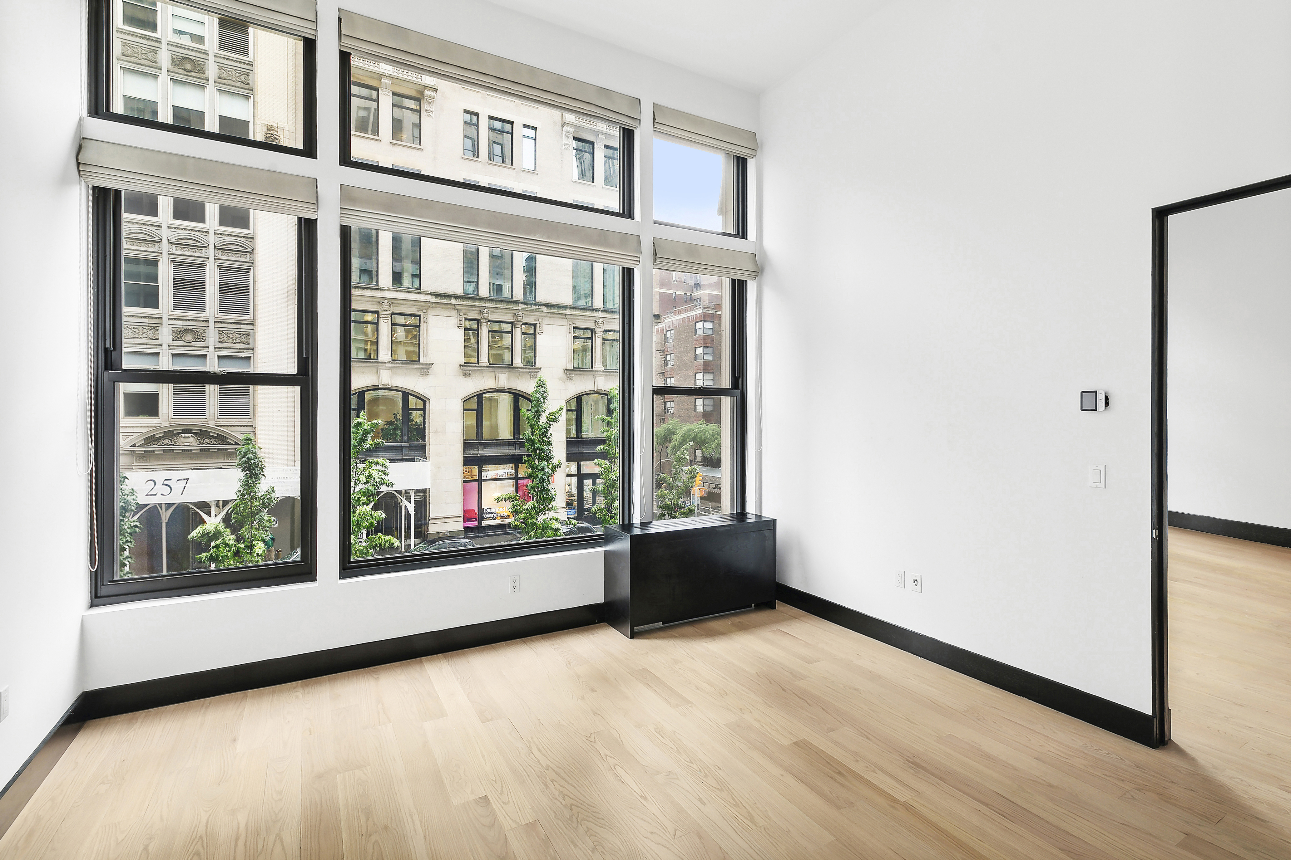 254 Park Avenue South, Unit 3C Manhattan, NY 10010 - Photo 5 of 9 a view of an empty room with a window