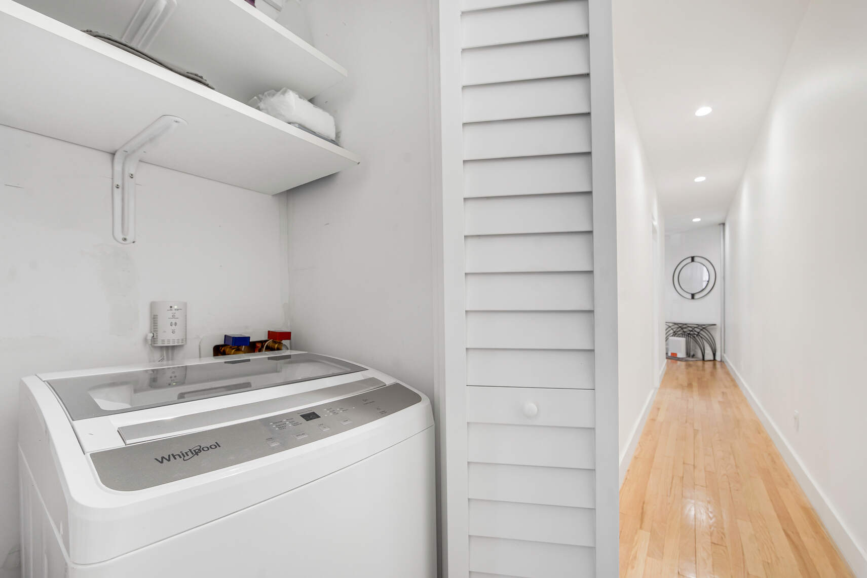 1878 Adam Clayton Powell Jr Boulevard, Unit 52 Manhattan, NY 10026 - Photo 8 of 13 a utility room with dryer and washer