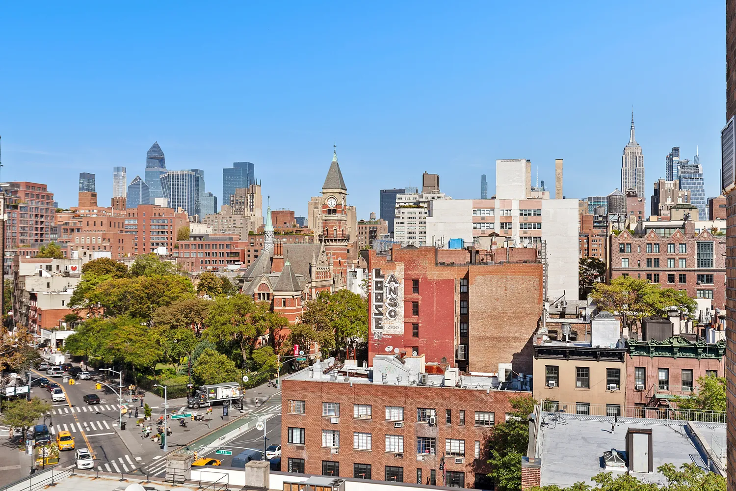 a view of city with tall buildings