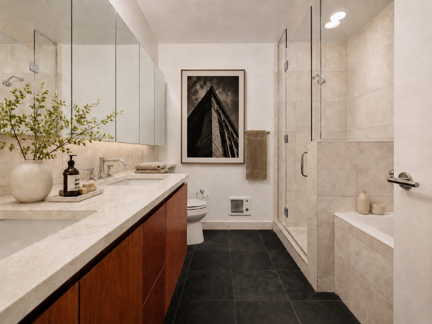 255 Hudson Street, Unit 7D Manhattan, NY 10013 - Photo 4 of 7 a bathroom with a sink a toilet and shower