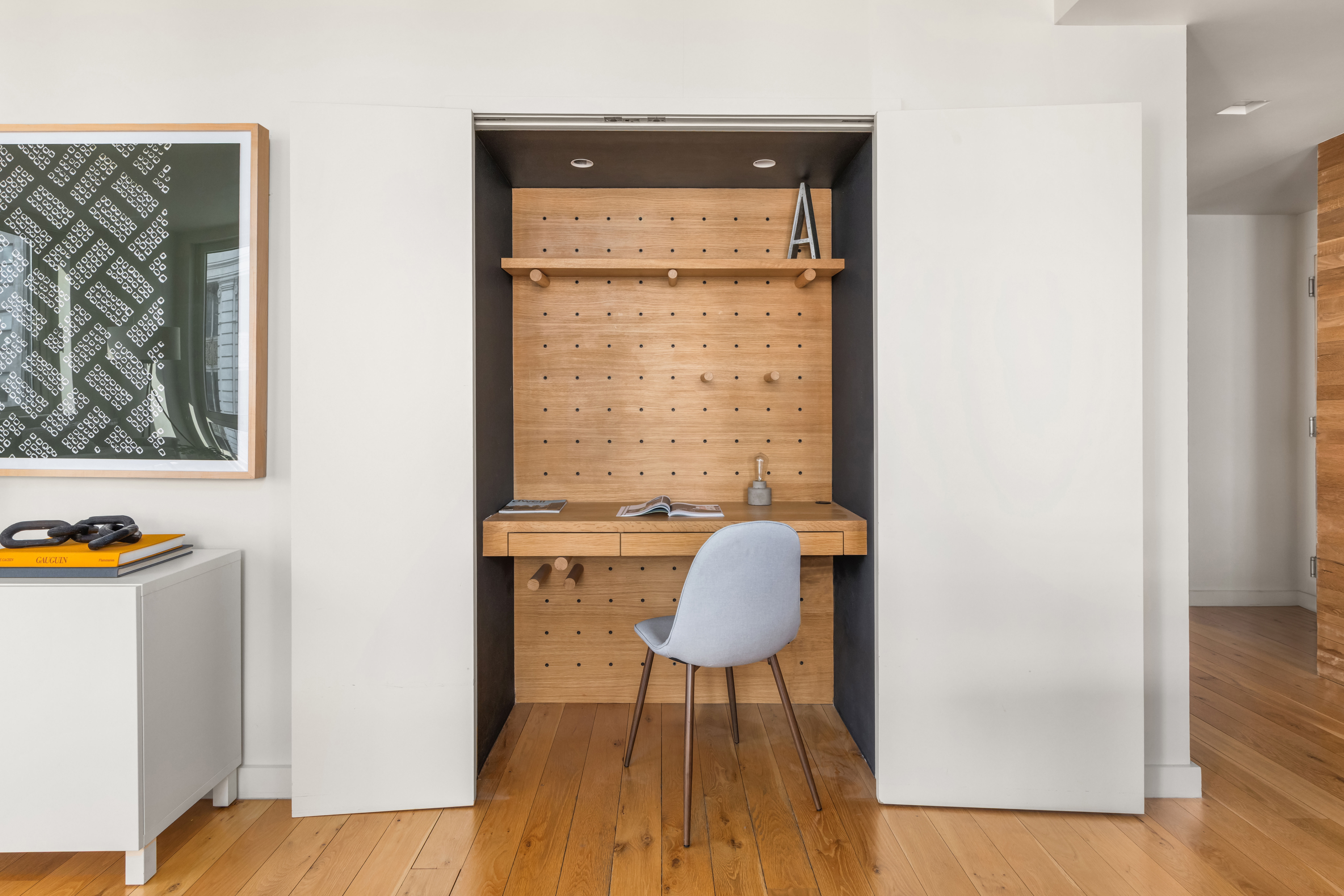 1 Irving Place, Unit G20A Manhattan, NY 10003 - Photo 5 of 14 a view of a workspace with furniture and wooden floor