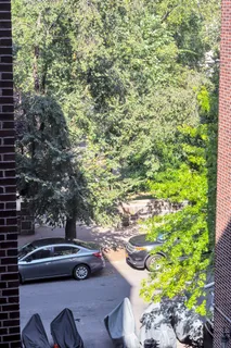 a view of yard with patio