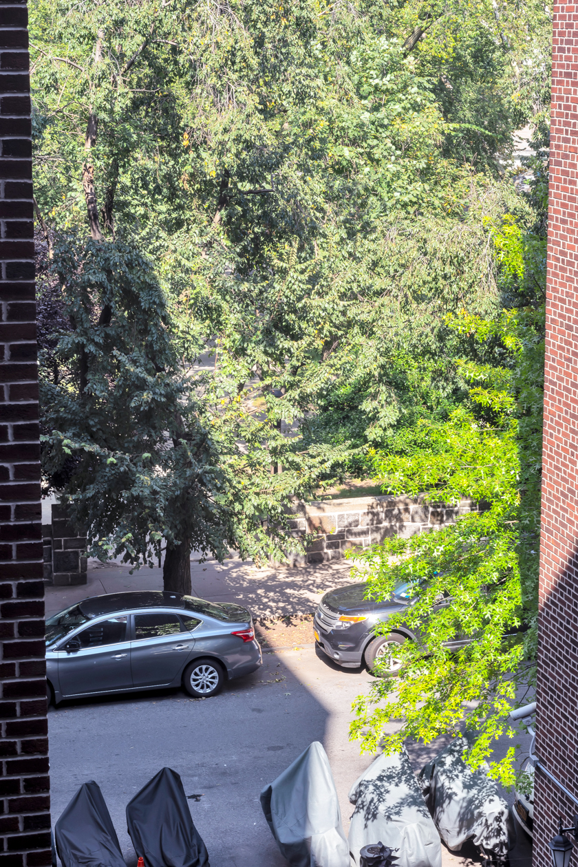 720 West 173rd Street, Unit 38 Manhattan, NY 10032 - Photo 7 of 9 a view of yard with patio
