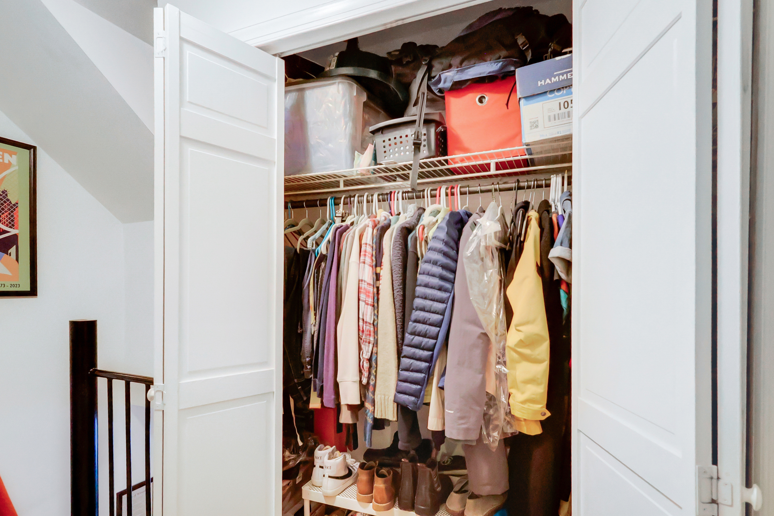 160 East 26th Street, Unit 2F Manhattan, NY 10010 - Photo 5 of 8 a view of walk in closet with clothes and shoes