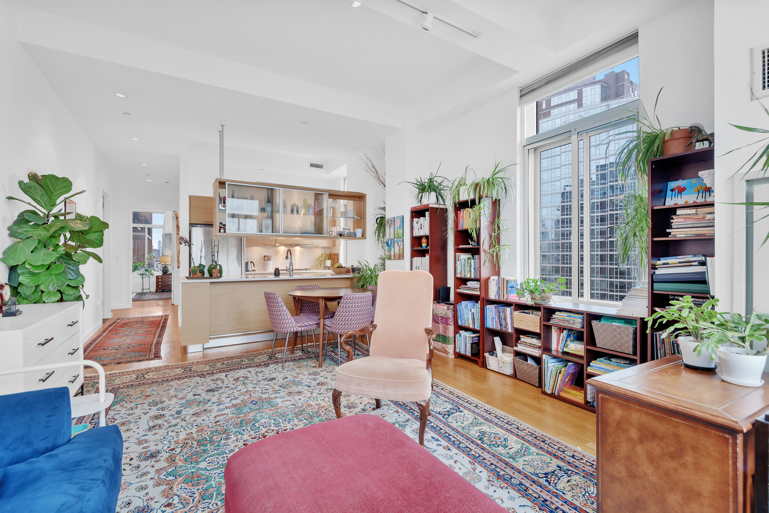 85 Adams Street, Unit 15D Brooklyn, NY 11201 - Photo 4 of 8 a living room with furniture and a potted plant