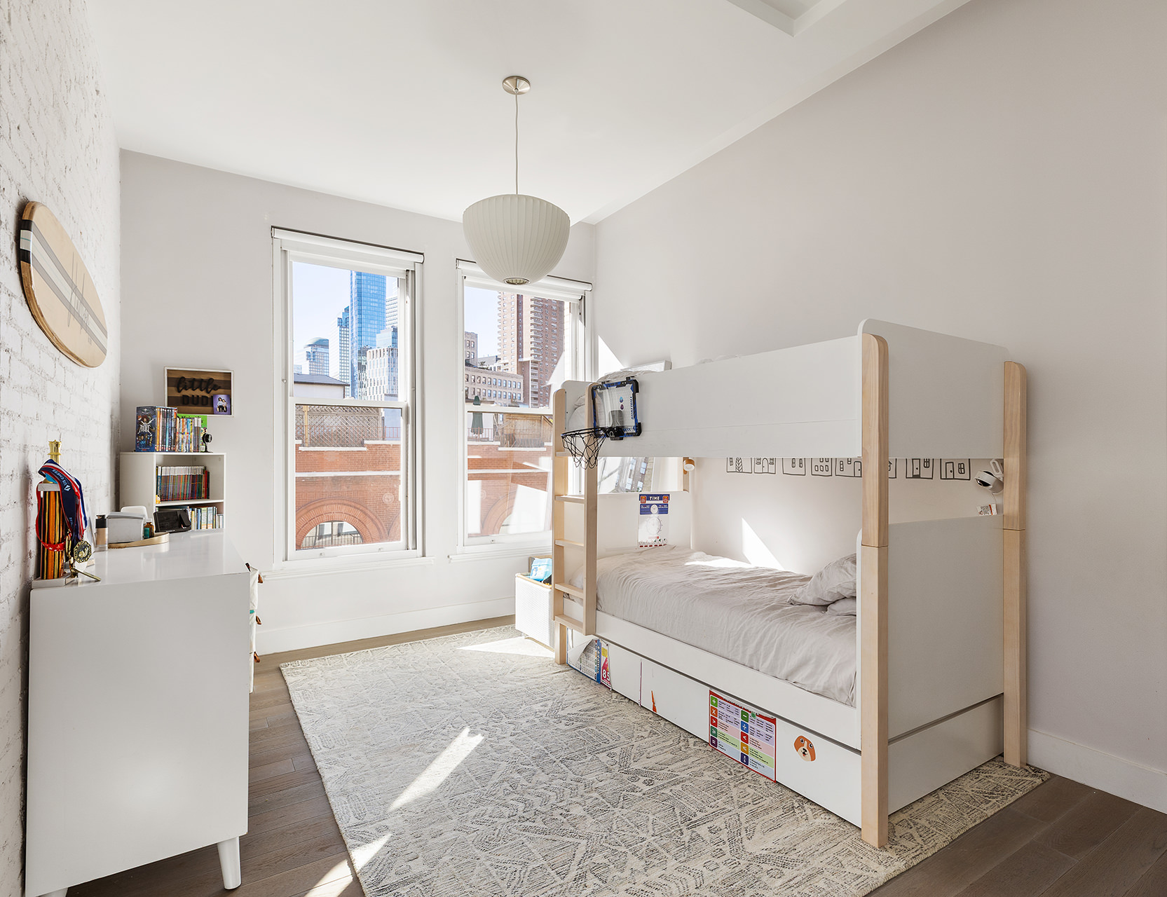 100 Hudson Street, Unit 7BC Manhattan, NY 10013 - Photo 15 of 20 a spacious bedroom with a bed and a chandelier