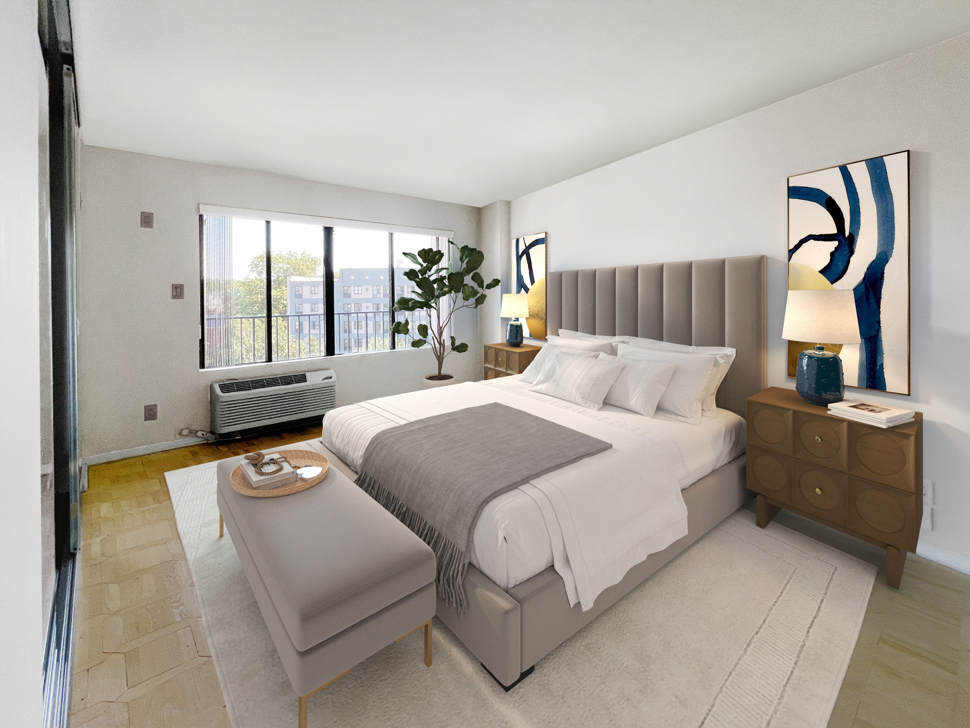 25-40 Shore Boulevard, Unit 6F Queens, NY 11102 - Photo 6 of 17 a bedroom with a bed and couch