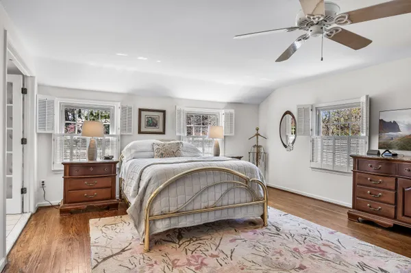 a view of a patio with a table and chairs